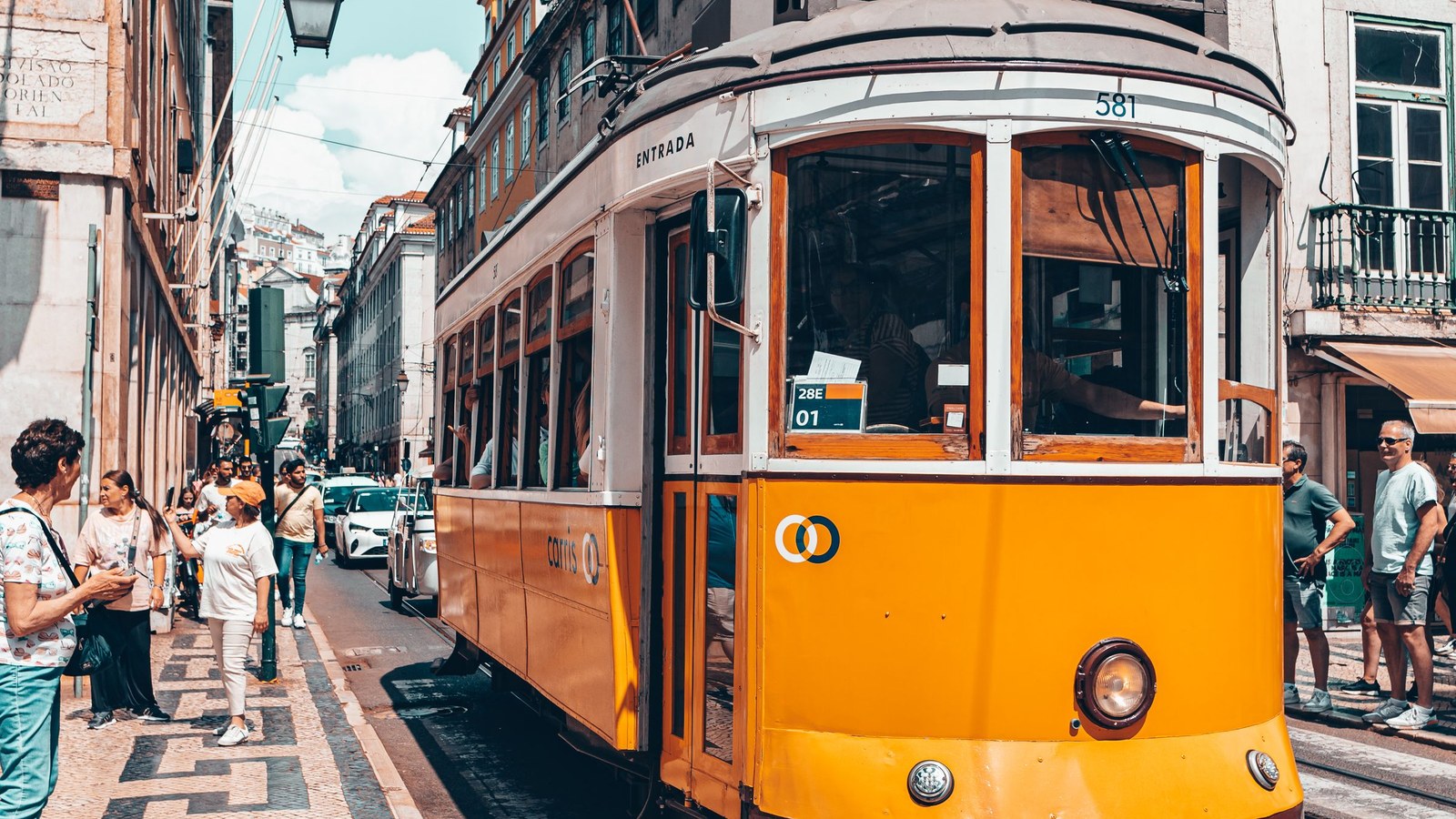 Yellow Tram 28 travelling through Lisbon