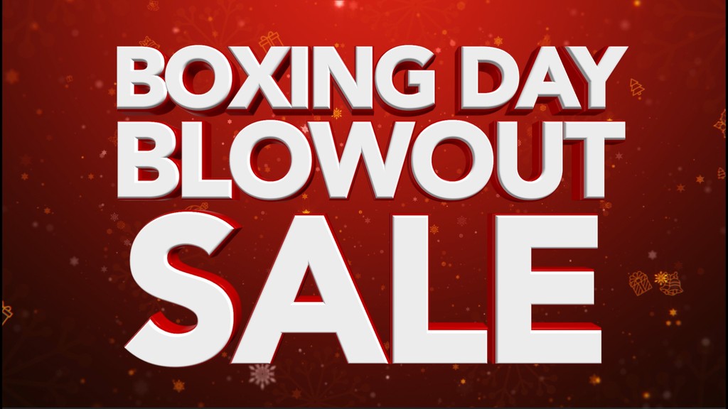 a bottle of wine next to a basket of cherries