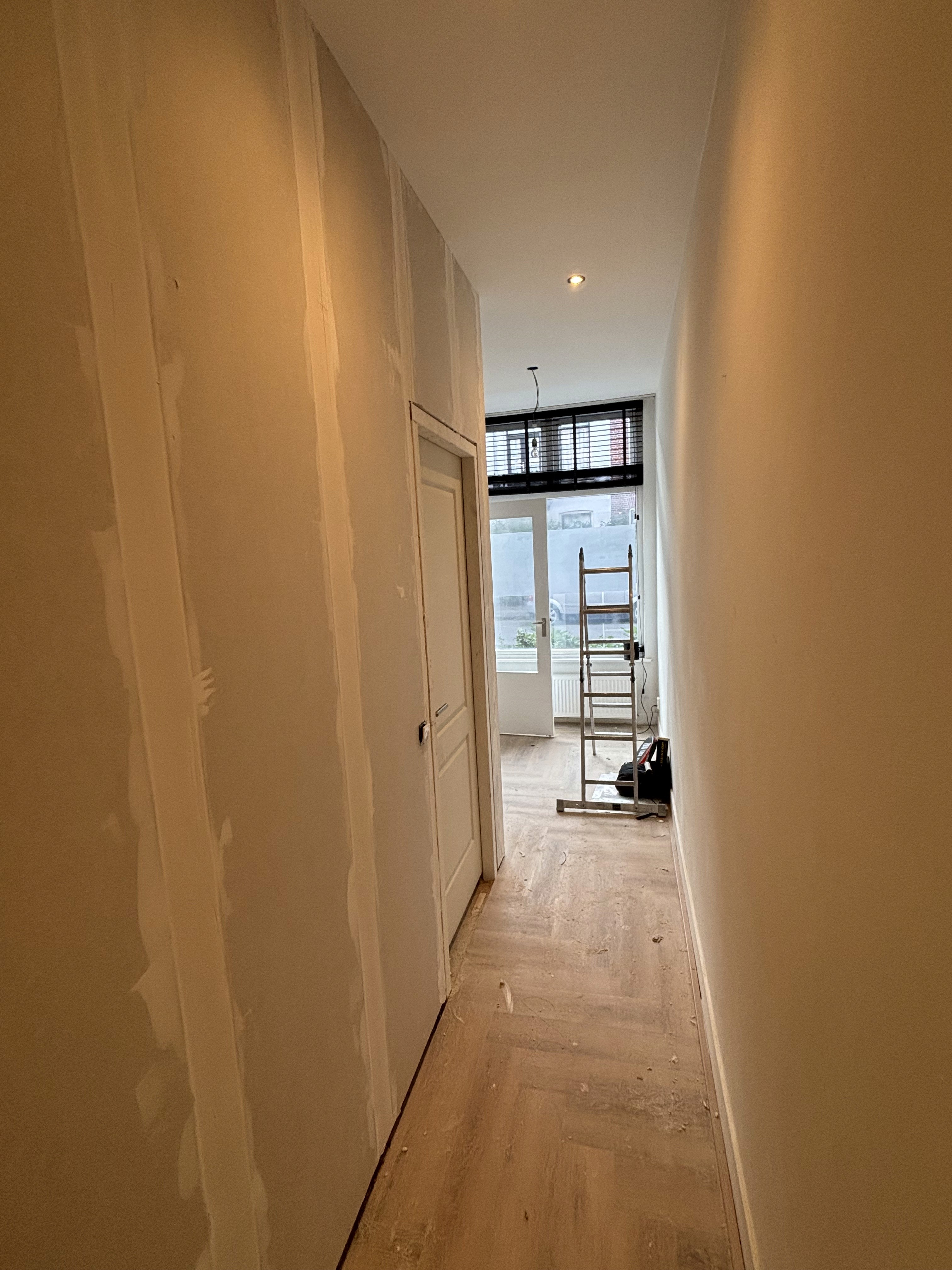 person writing on a piece of paper 