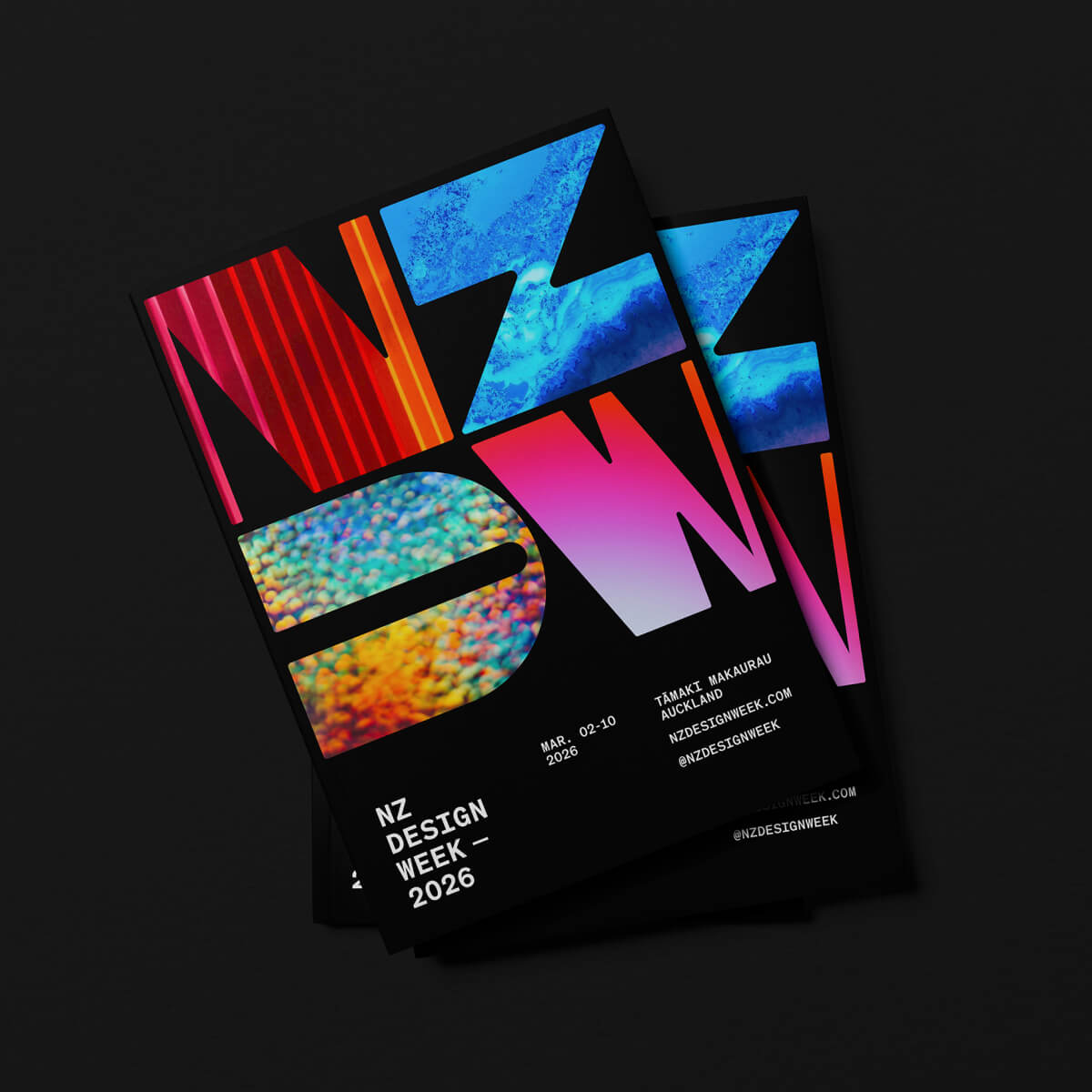 High-end mock-up of the front cover of the NZDW event guidebook by graphic designer Carl Dixon, for New Zealand Design Week, a major showcase of exhibitions, talks, workshops, and immersive experiences of all design disciplines, created for industry, creatives, and the design-curious.