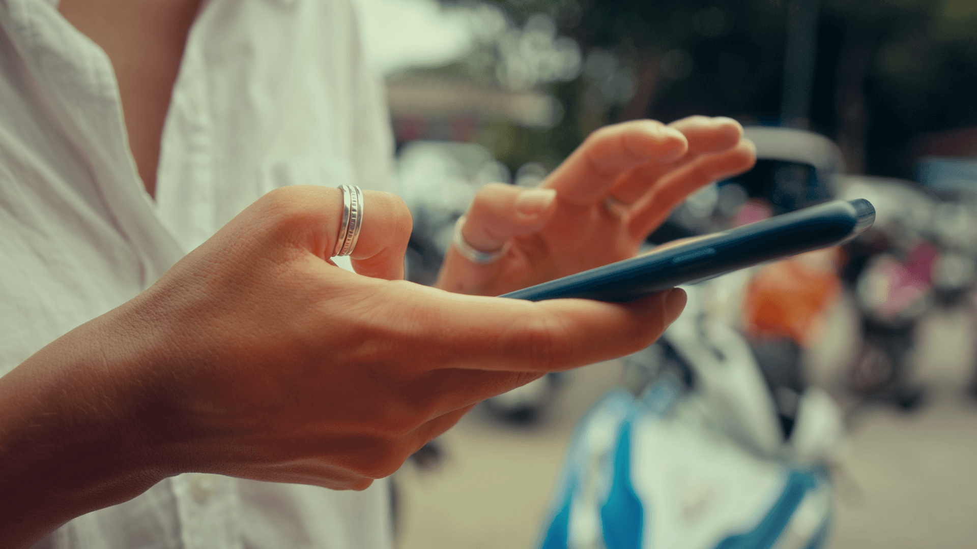 Woman using phone.