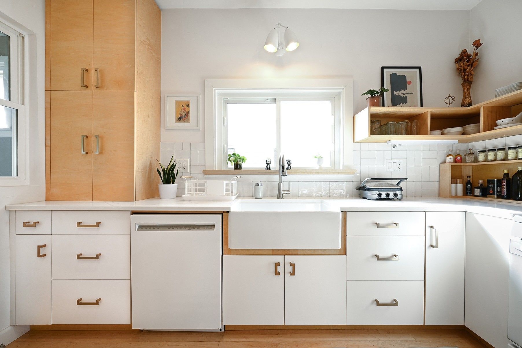 Modern kitchen cabinetry white and natural wood minimalist