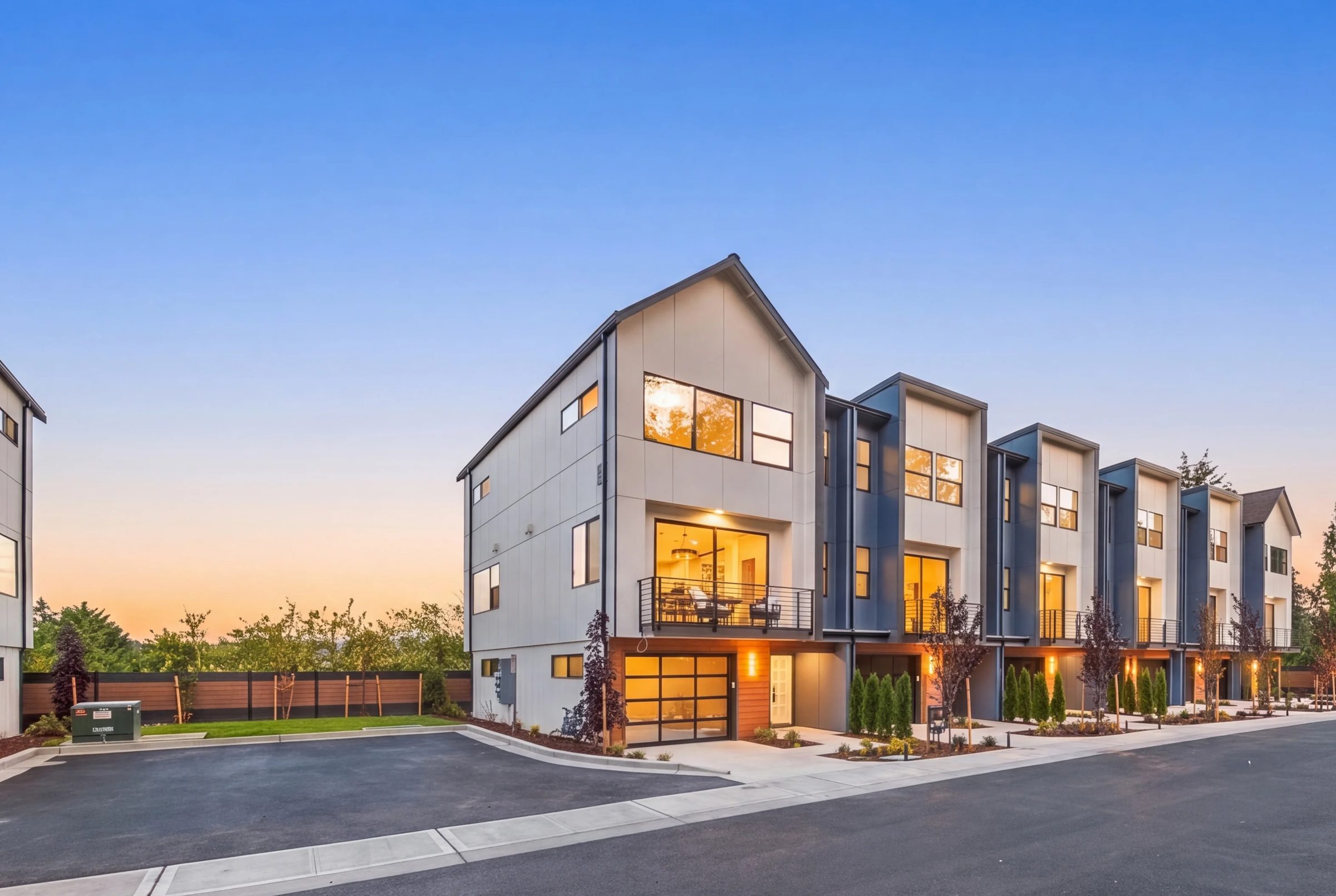 Duchess Townhomes exterior at dusk in Bothell, WA