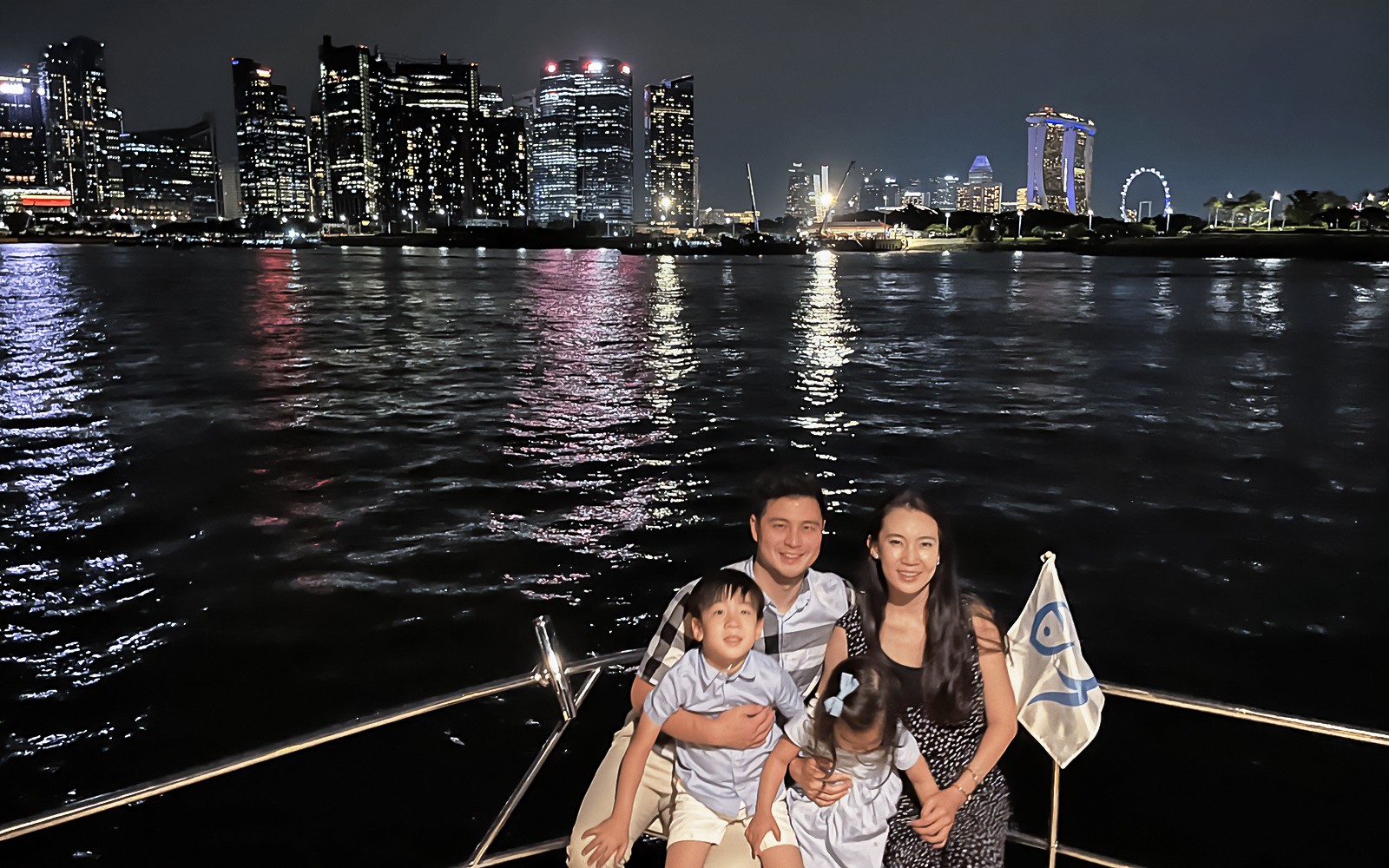 Marina Bay Sands yacht cruise with city skyline and iconic hotel view in Singapore.
