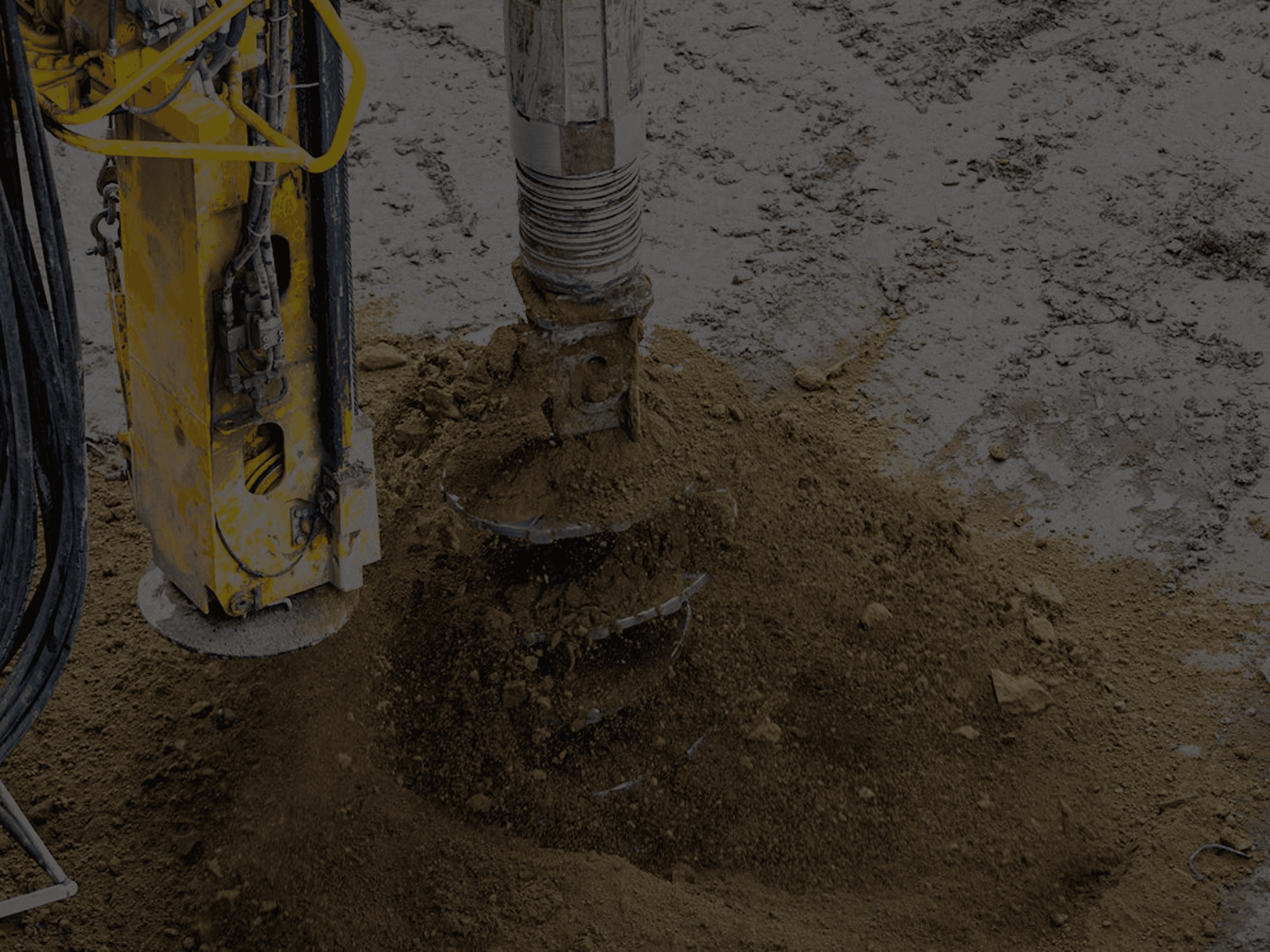 machine drilling into soil 