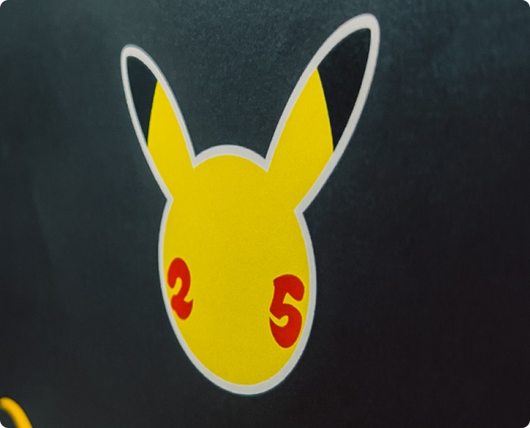 Closeup of a stylized Pikachu sticker from the influencer kit case