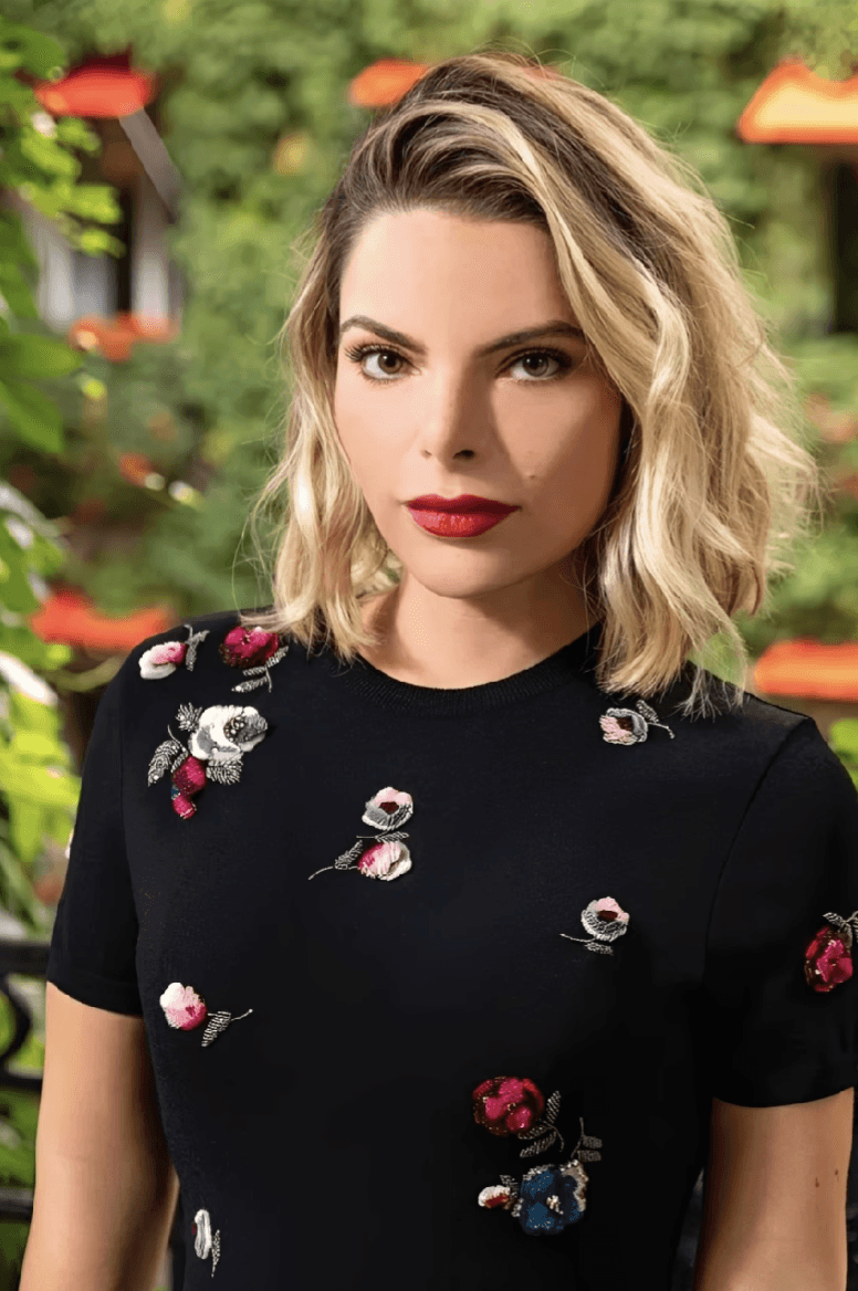 corporate woman folding arms