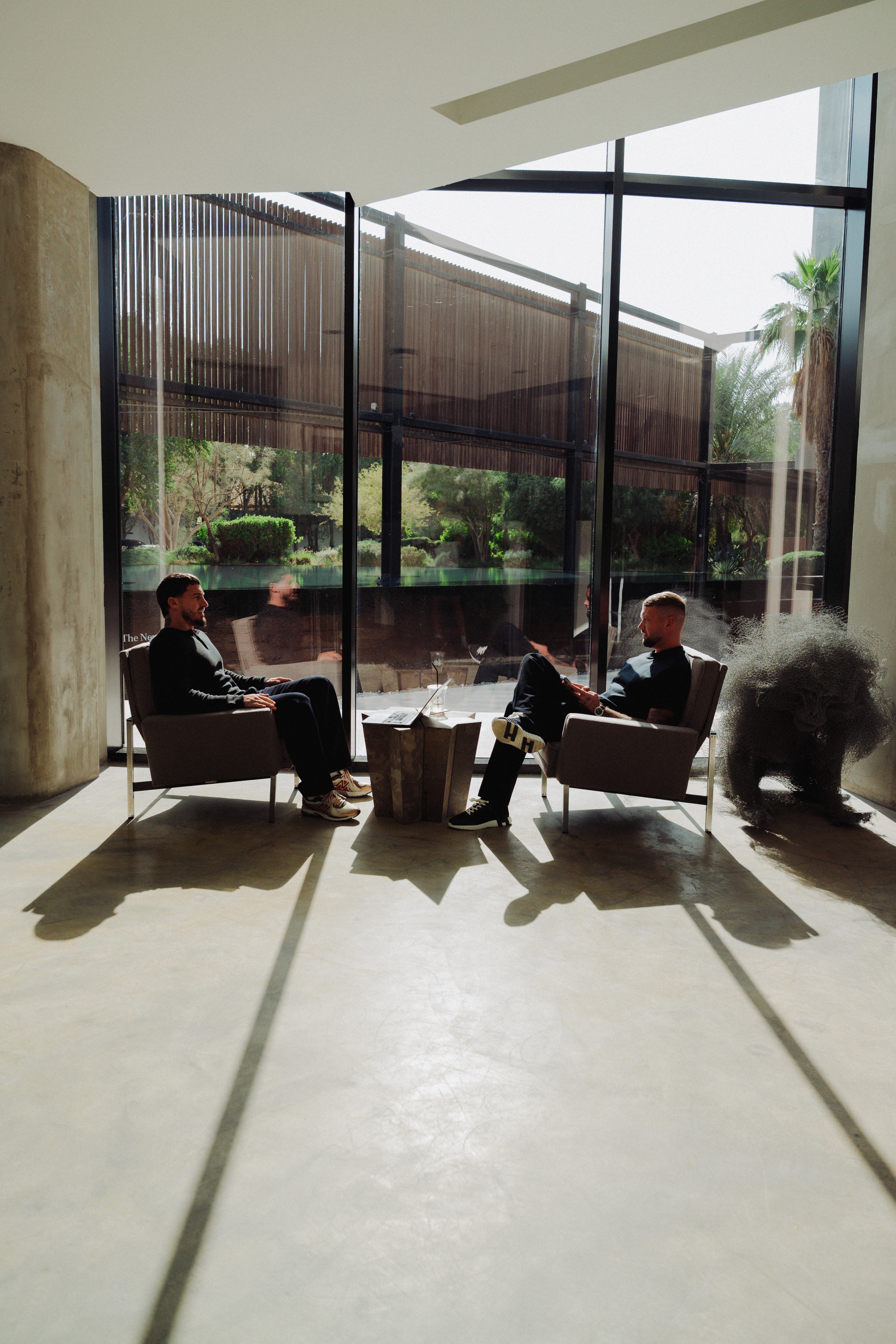 R & B Global Consultants legal recruitment team in discussion at a contemporary office