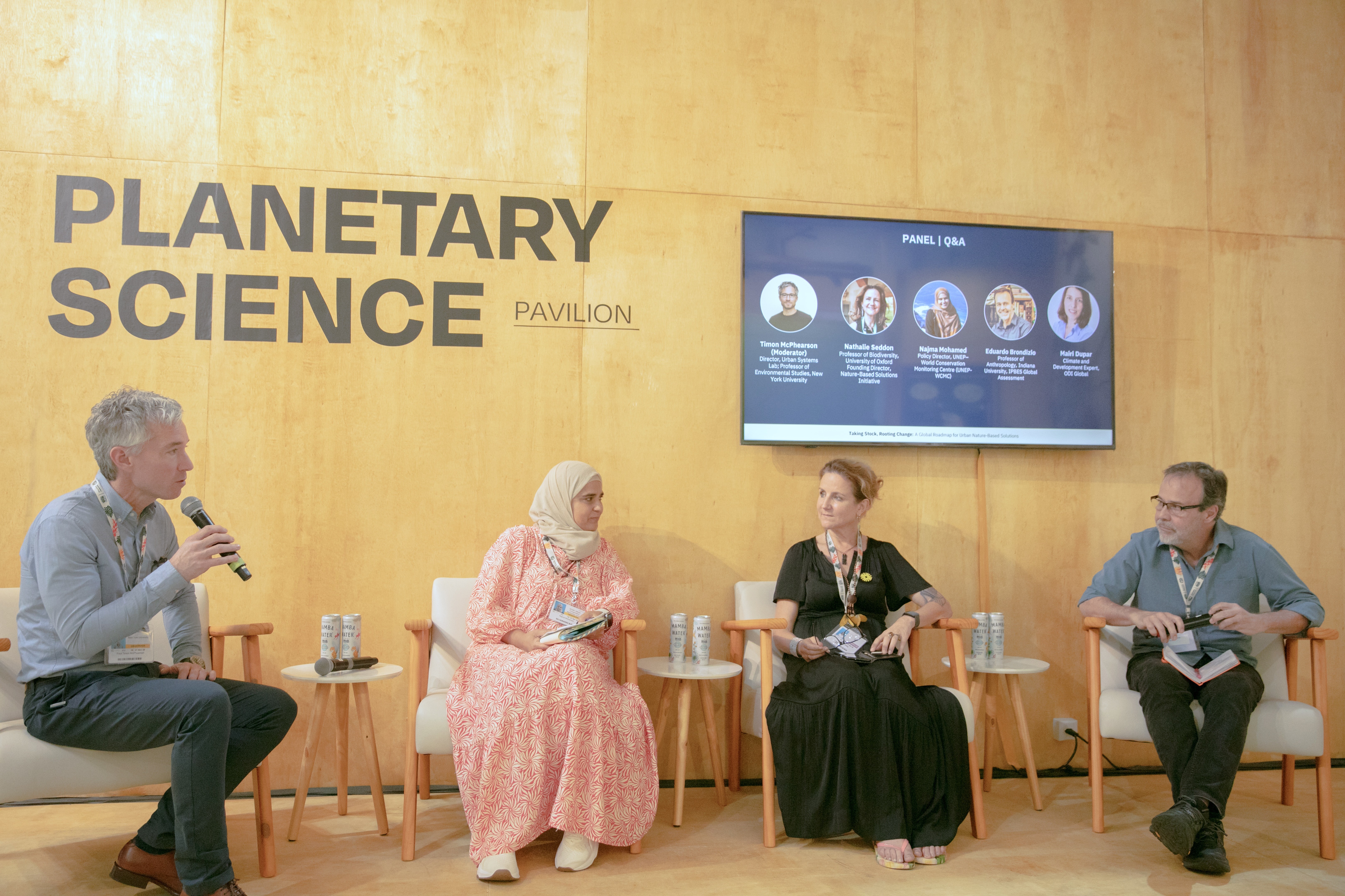 Timon interviewing the panel at COP30