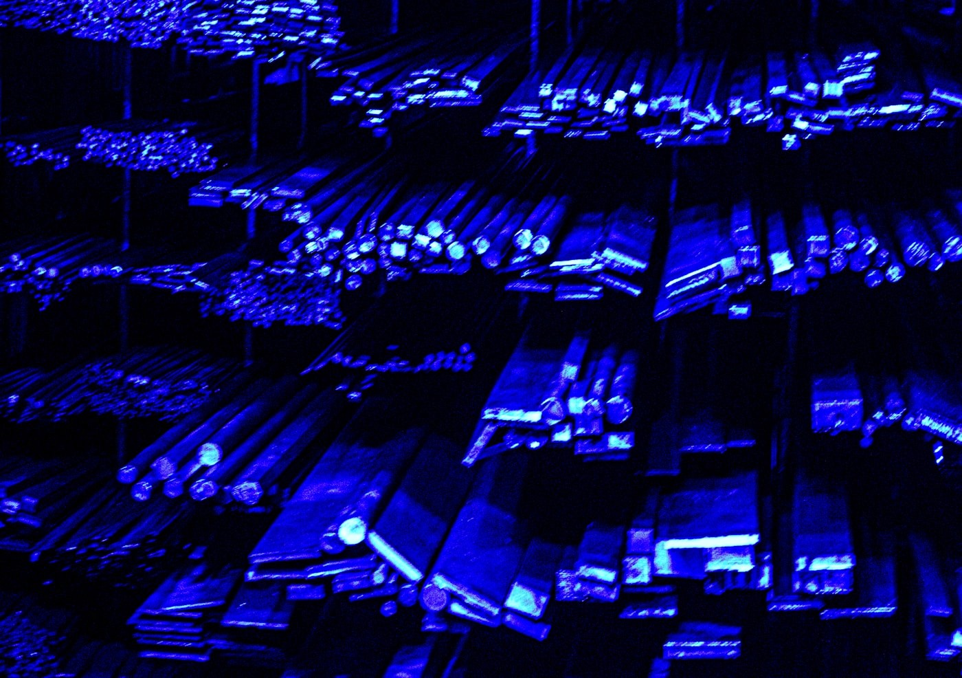 Blue-lit data center infrastructure
