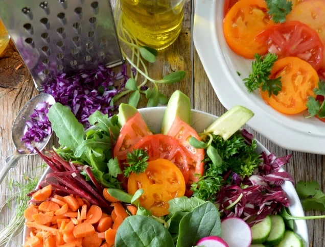 Fresh vegetables being prepped in a bowl