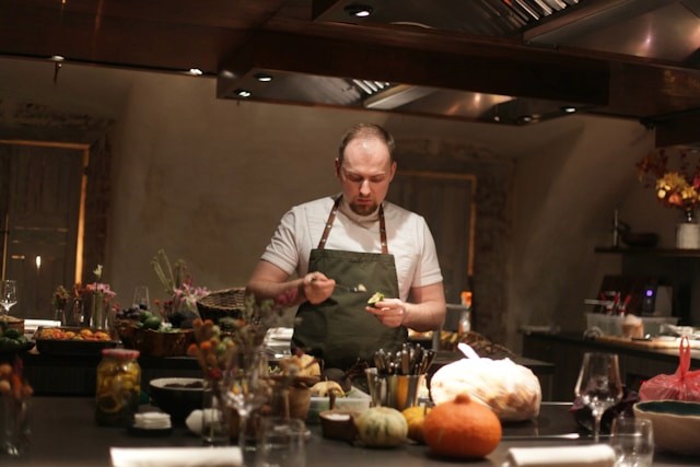 man in white dress shirt wearing white goggles