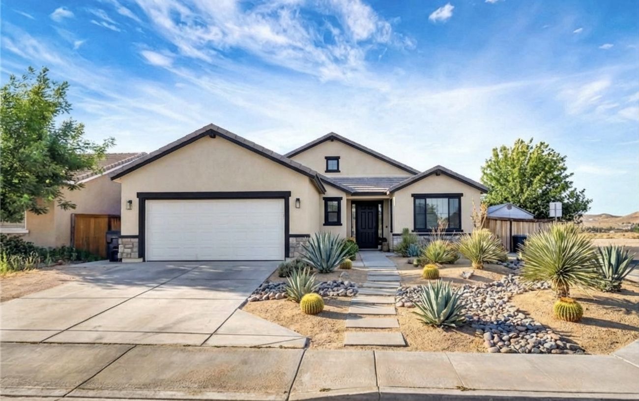 Modern desert exterior with sand stucco and black frames by AI visualizer