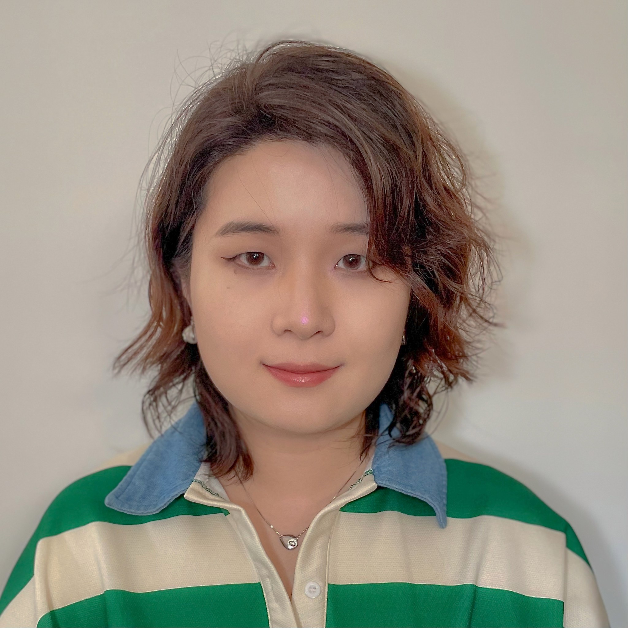 headshot of smiling woman looking at the camera