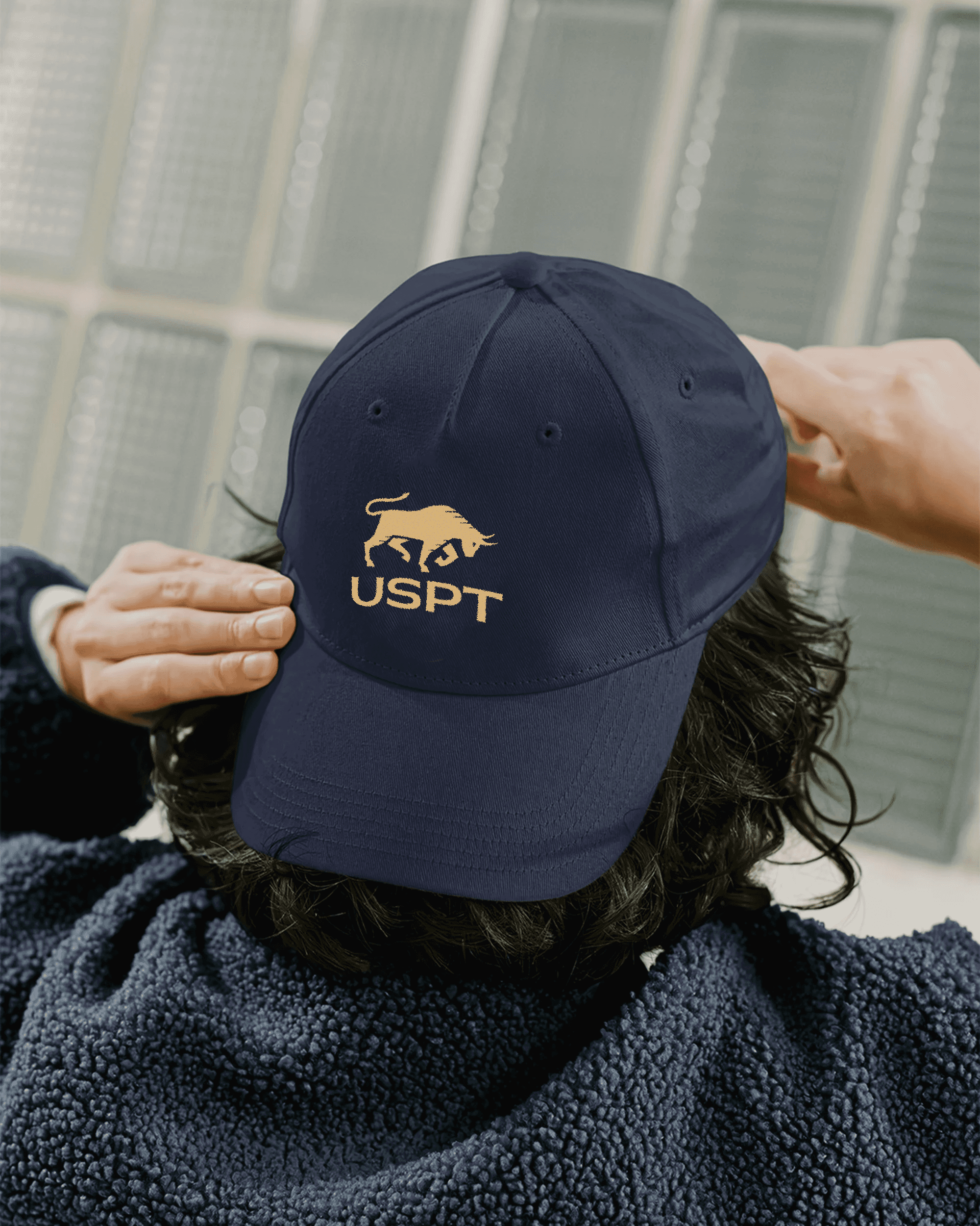 Modern home office setup with a monitor, ergonomic chair, keyboard, and indoor plants near a window with blinds.