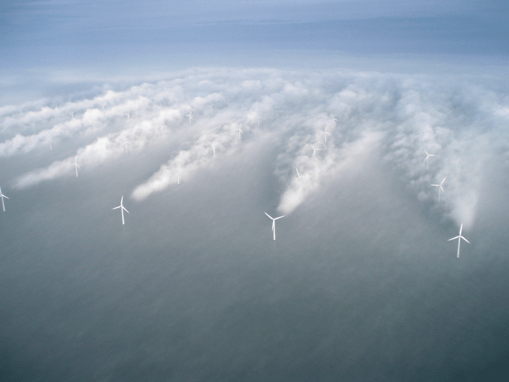 scenic aerial photo of Vattenfall windmills at sea