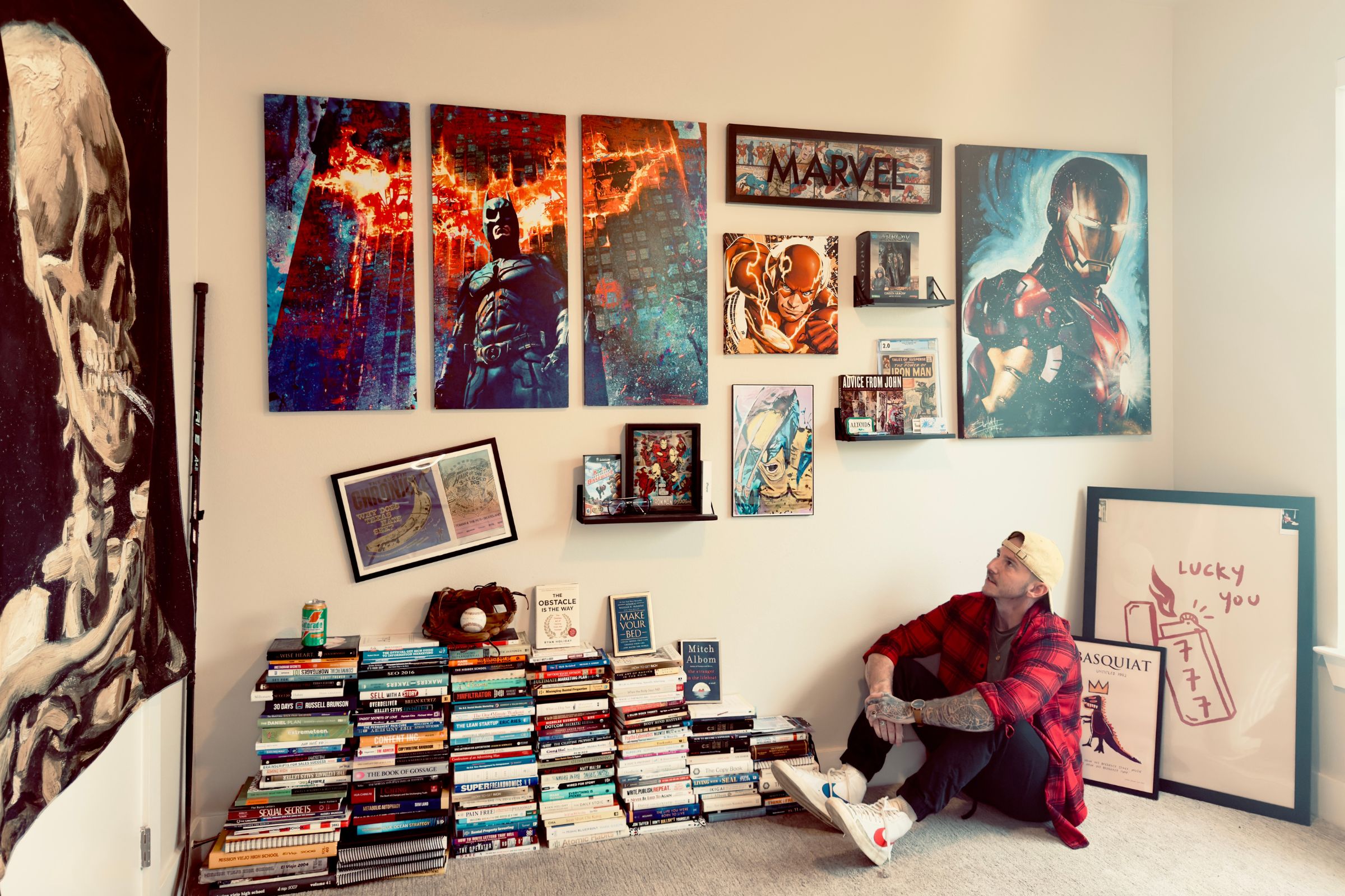 Young black woman witting at the table working on a laptop