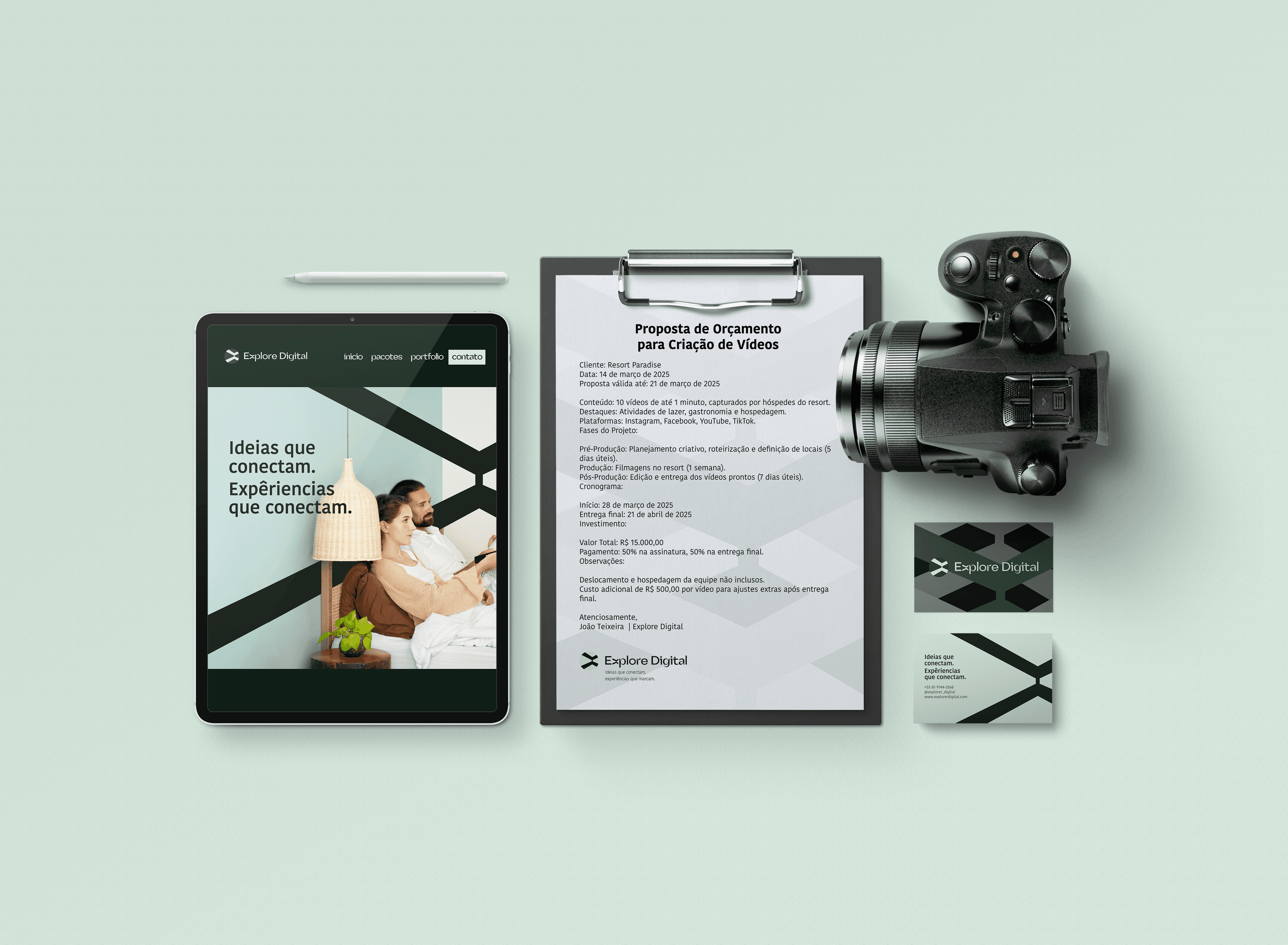 Aerial view of a winding road cutting through rocky terrain and sandy landscape.