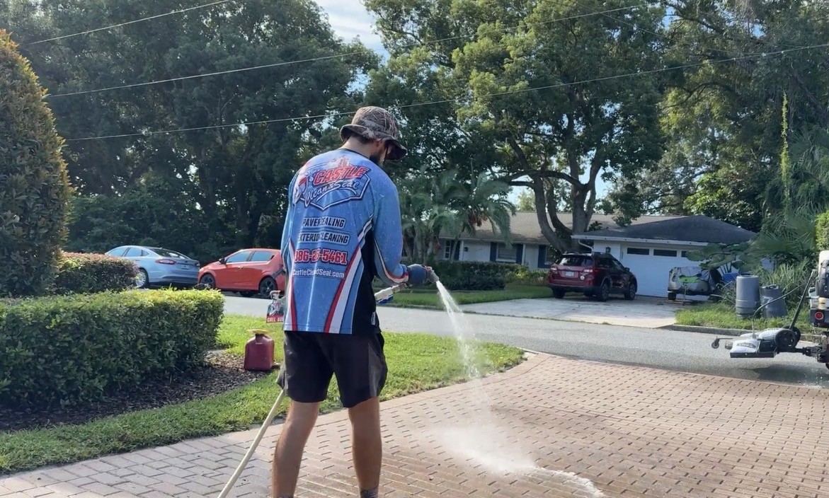 Picture of technician spraying algicide