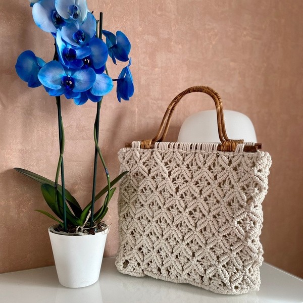 Handcrafted macrame tote bag with woven cotton pattern and handles