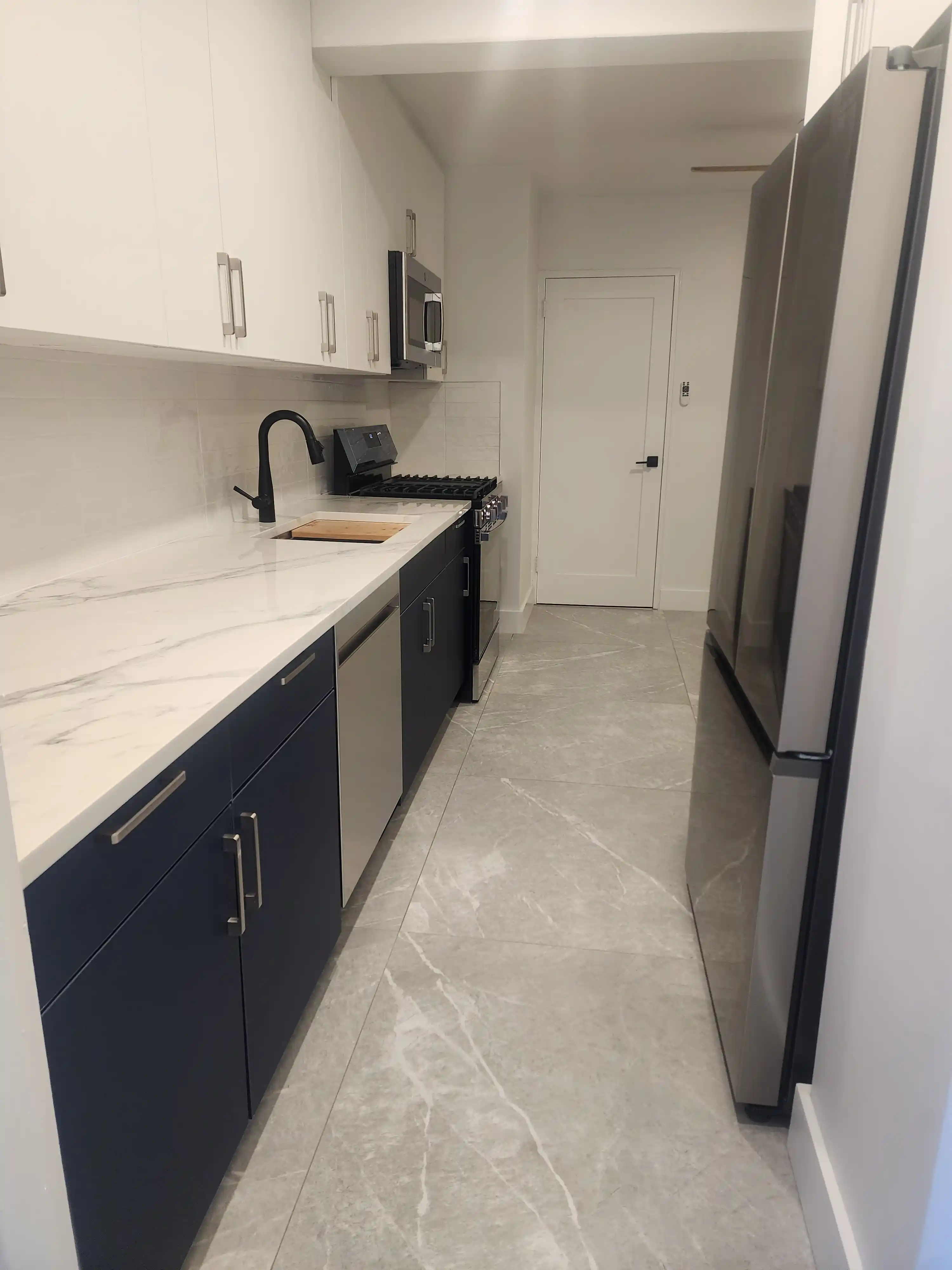 Trex composite deck with recessed lighting, and Transcend railings in Queens, NYC