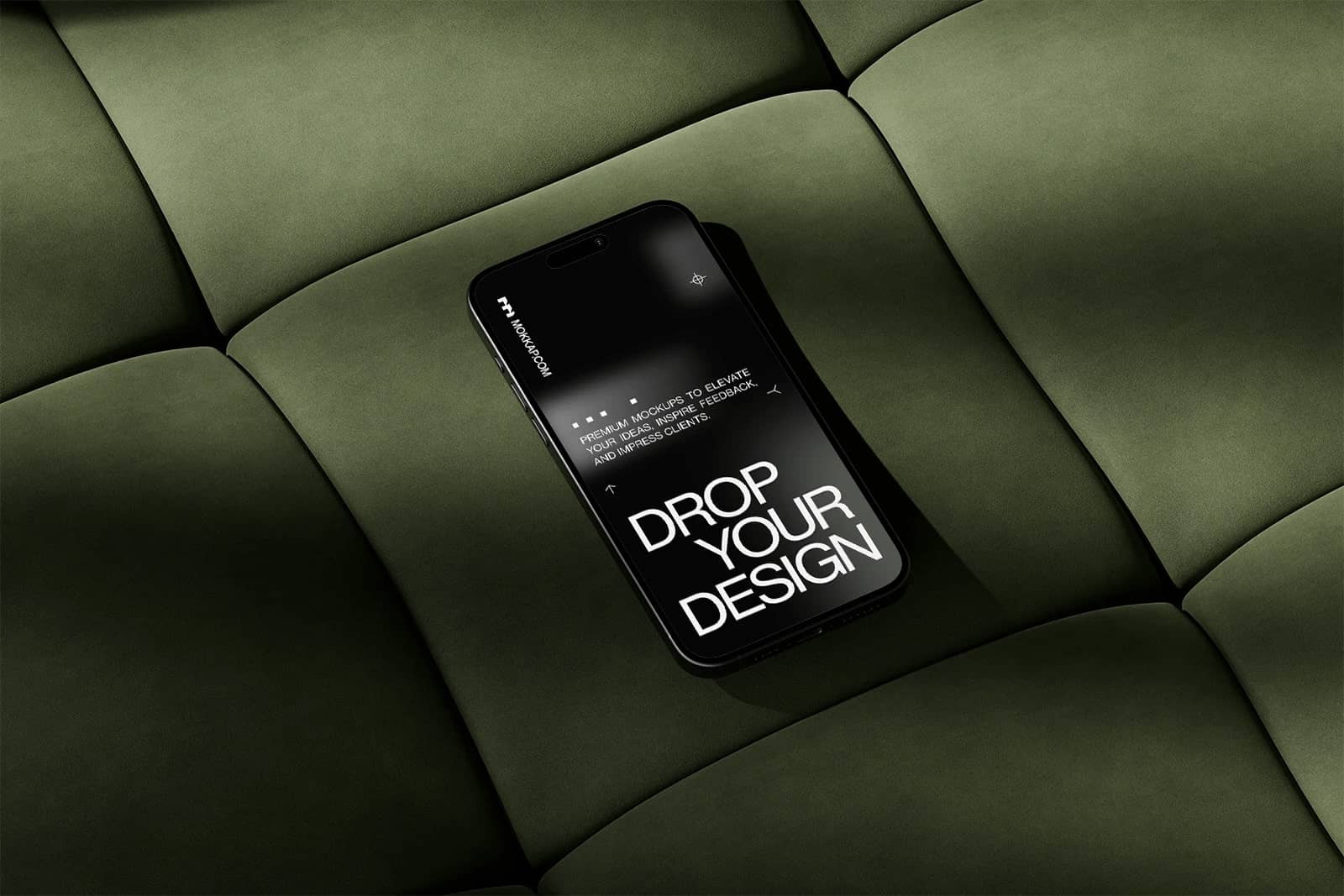 iphone mockup on green sofa