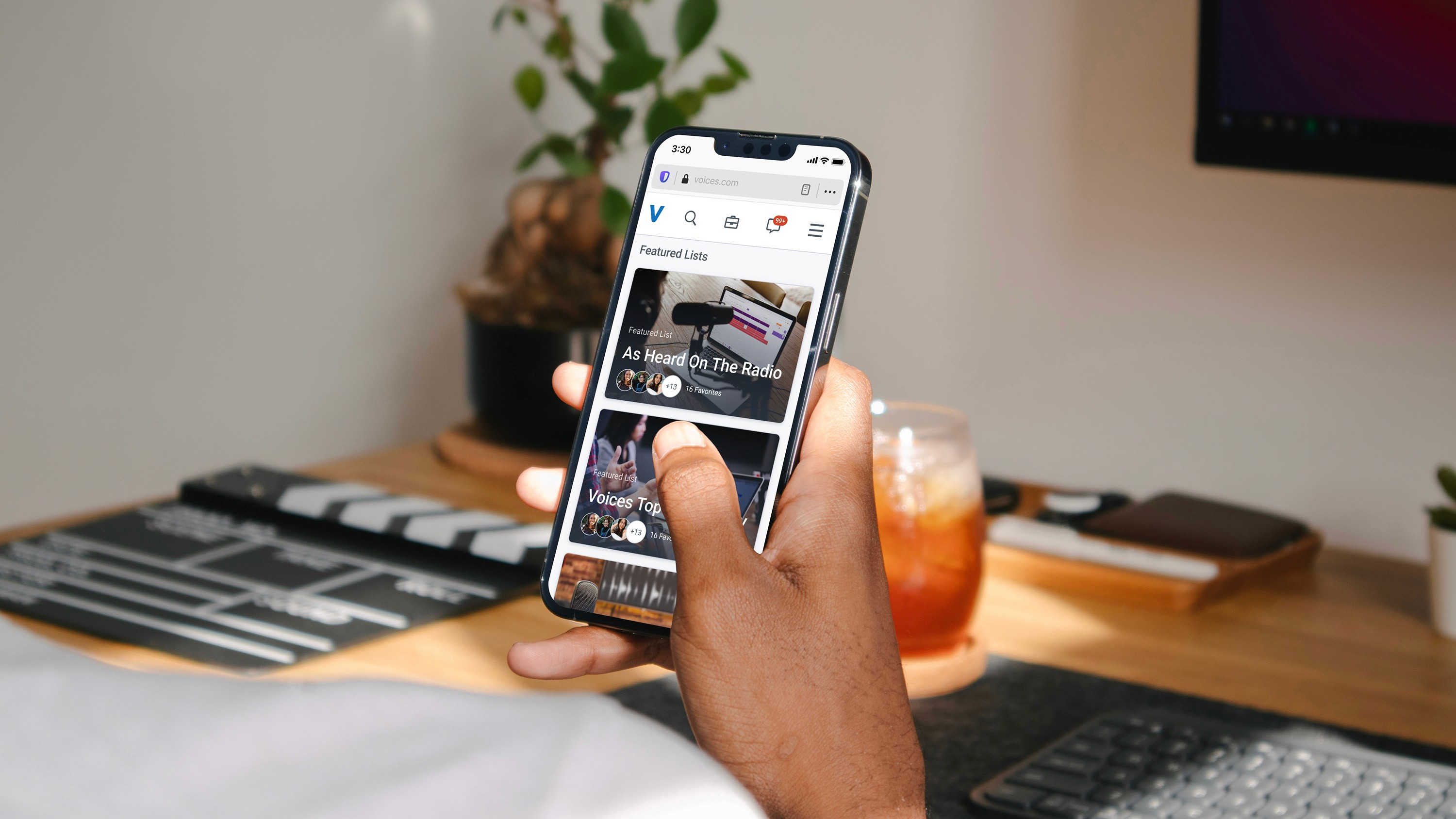 Someone interacting with a beautiful Voices app design.