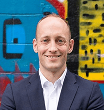 Photo of a white midle man age, Hans Galland, CEO of BeyondTrucks and co-author of the white paper "Generational Transitions for Trucking Business Owners published on the Beyond Trucks website