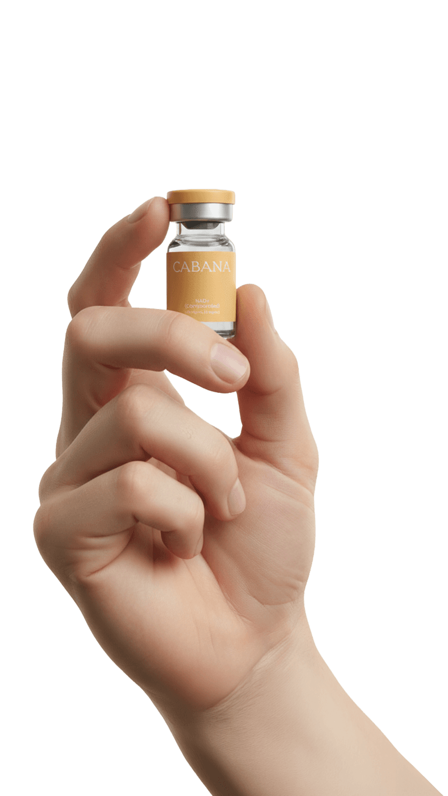 Hand holding a small Cabana NAD+ vial with a yellow label against a clean, neutral background