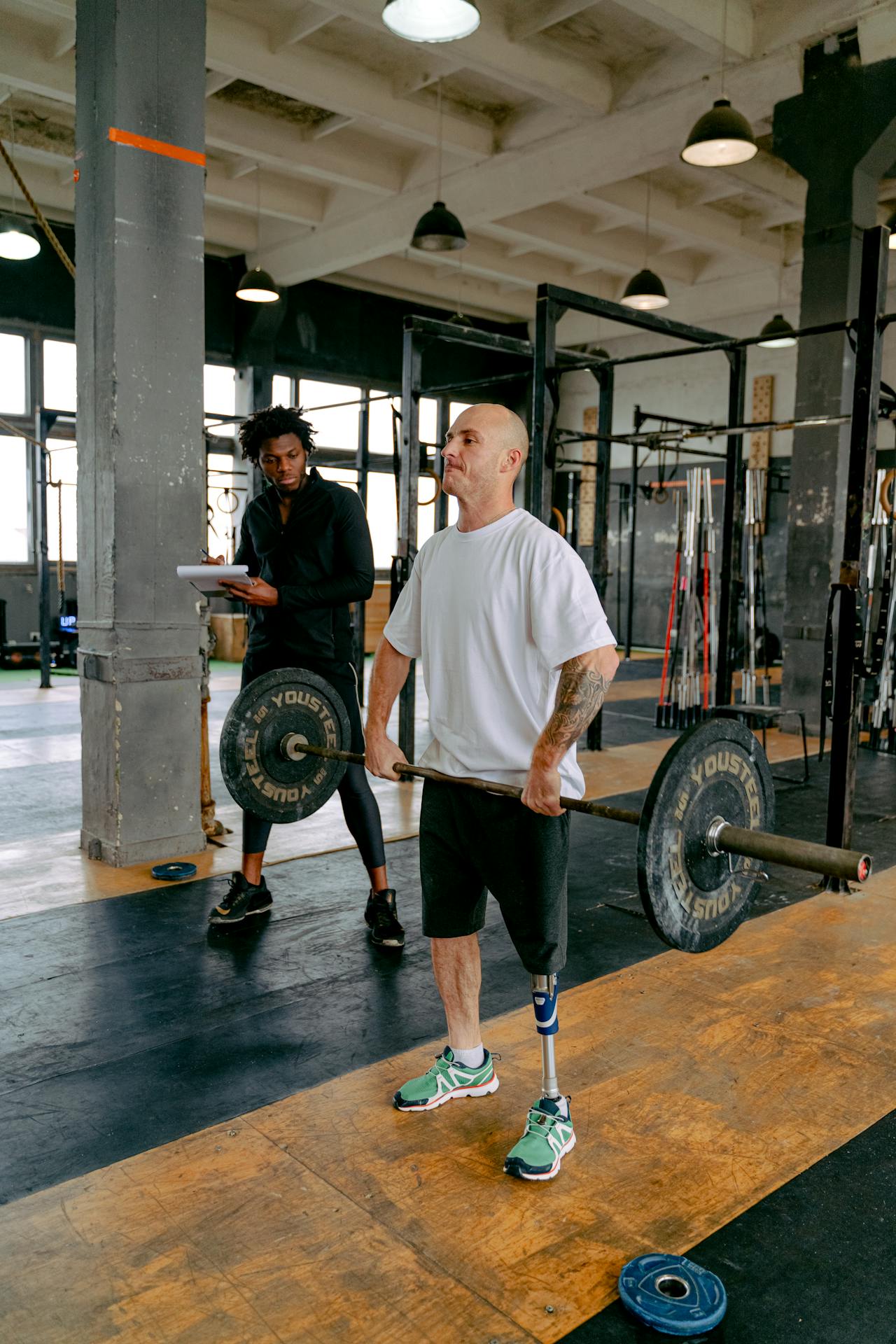 A Man Working Out in the Gym