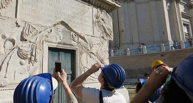 people talking photos of ancient architecture