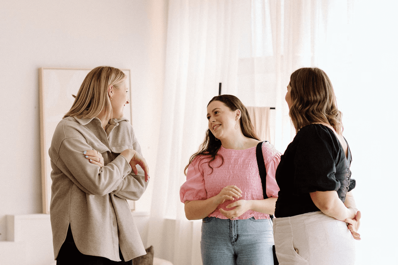Kate, Curate Media founder, speaking to Haley of Haley Adele Photography and Charlotte of Tide & Trace