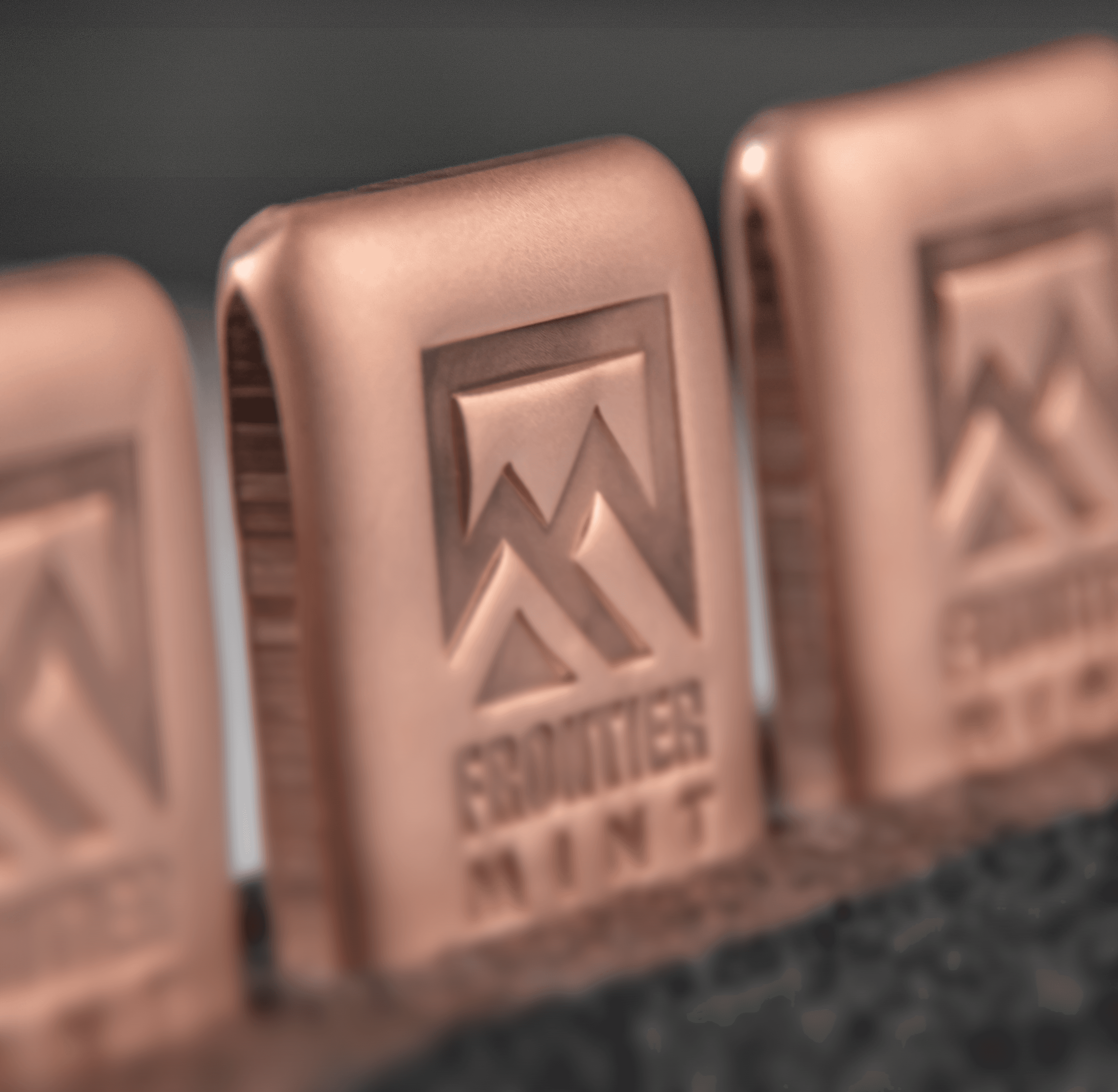 Close-up of the textured surface of a .999 fine copper bar produced by Frontier Mint.