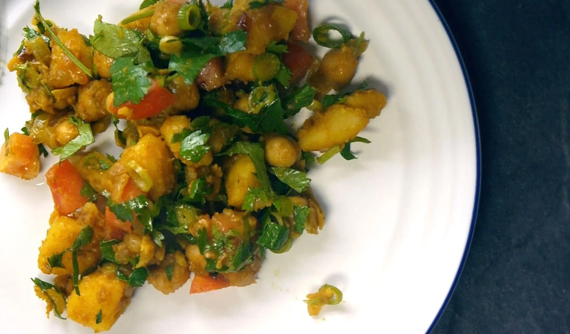 Chickpea curry on white plate