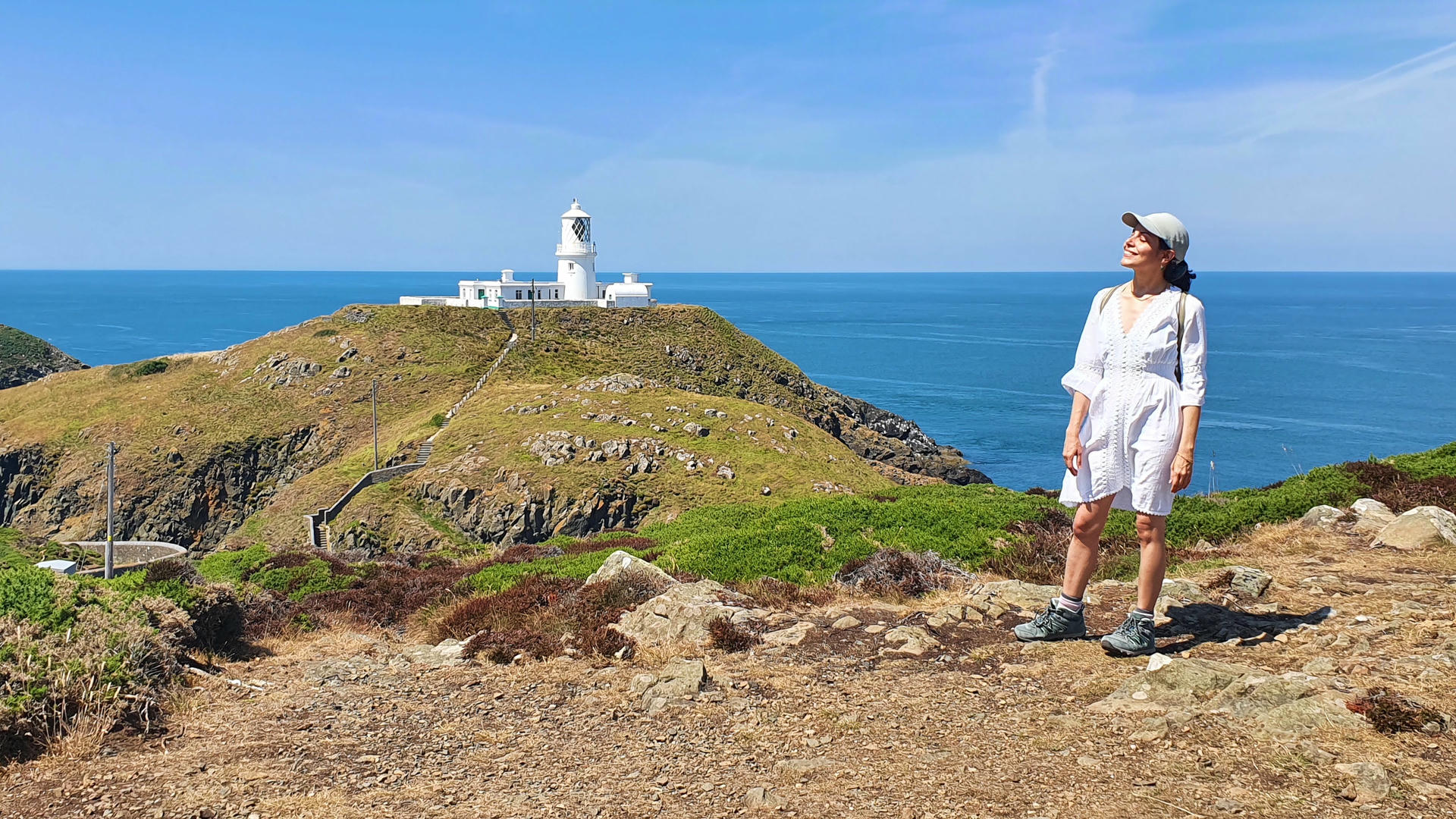 Samira walking towards old bridge in nature