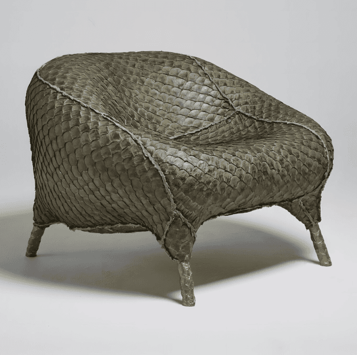 two people looking at a tablet and smiling