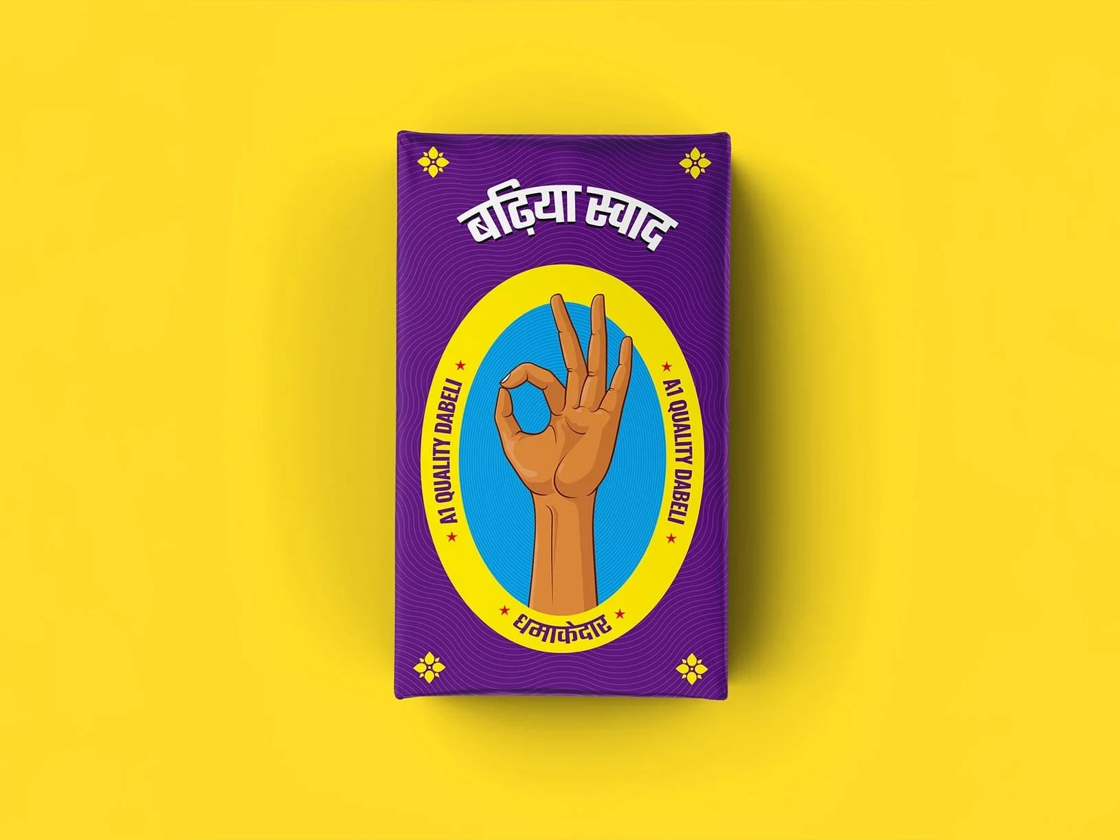 Purple Bengali-labeled package featuring an orange hand making an OK gesture inside a yellow-and-blue oval, on a bright yellow background.