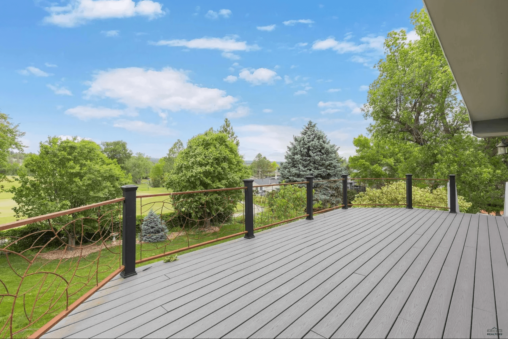 Elevated outdoor deck overlooking Arrowhead Country Club