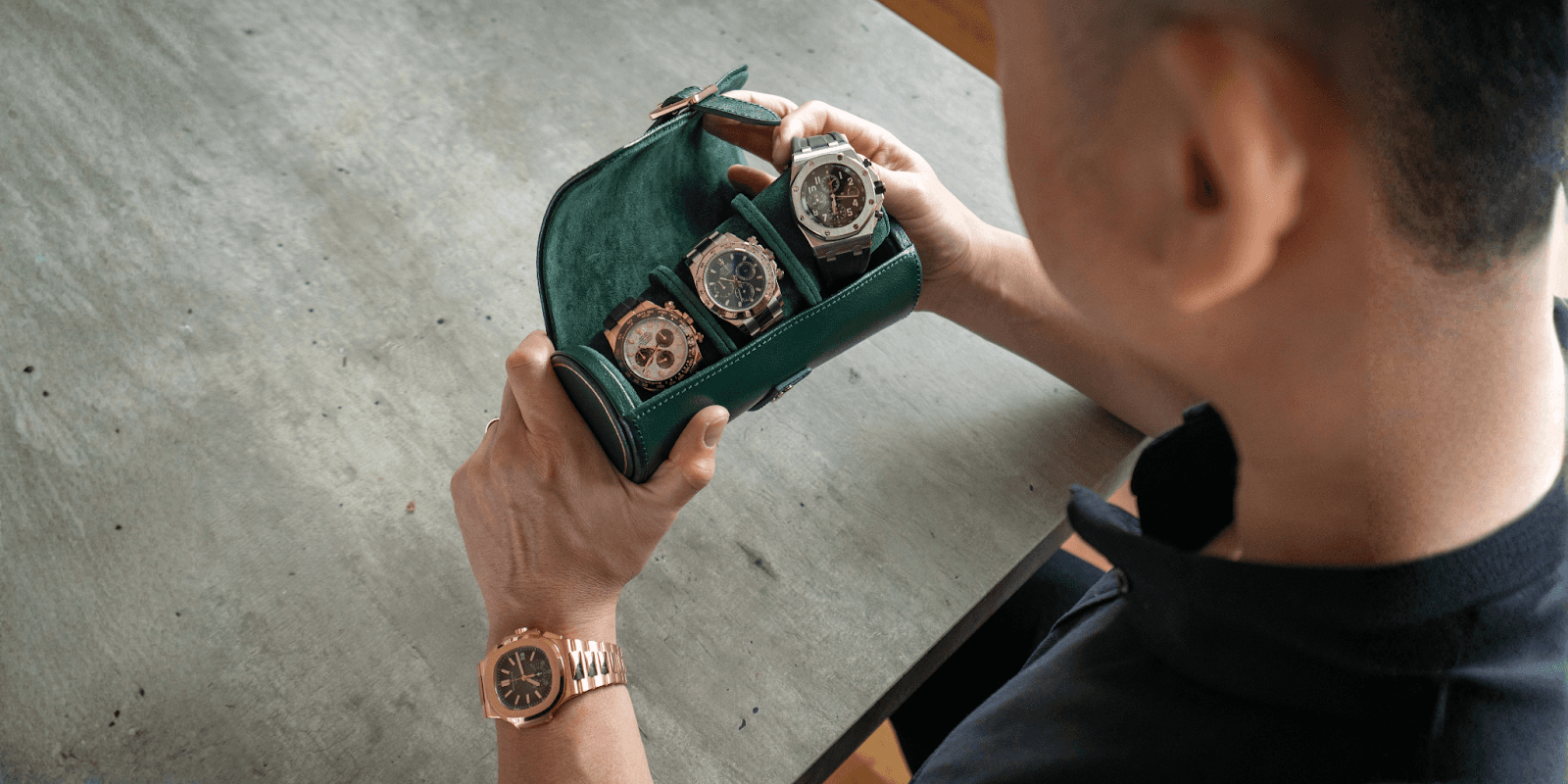 Oliver Roldan showcasing luxury timepieces, reflecting his passion for meaningful achievements and resilience.