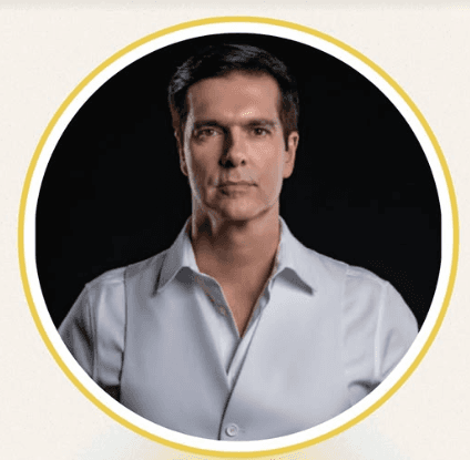 Woman participating in a virtual training session on a laptop