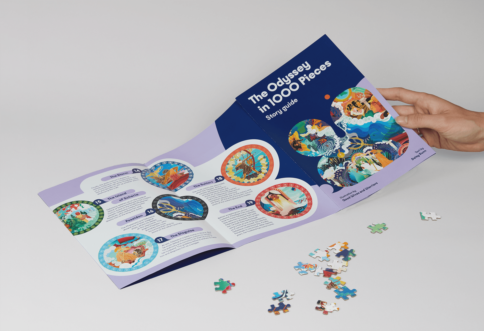 Editorial leaflet from the Gift Lab collection opened by hand, showing colorful illustrated spreads.