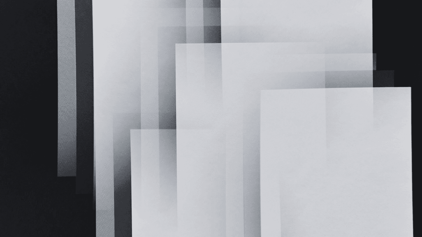 An image of office room with a room with a table and chairs