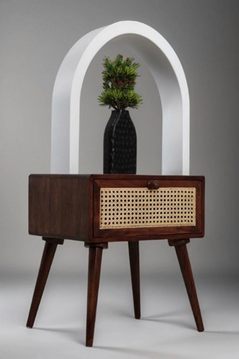 Handcrafted wooden side table with drawer and cane panel