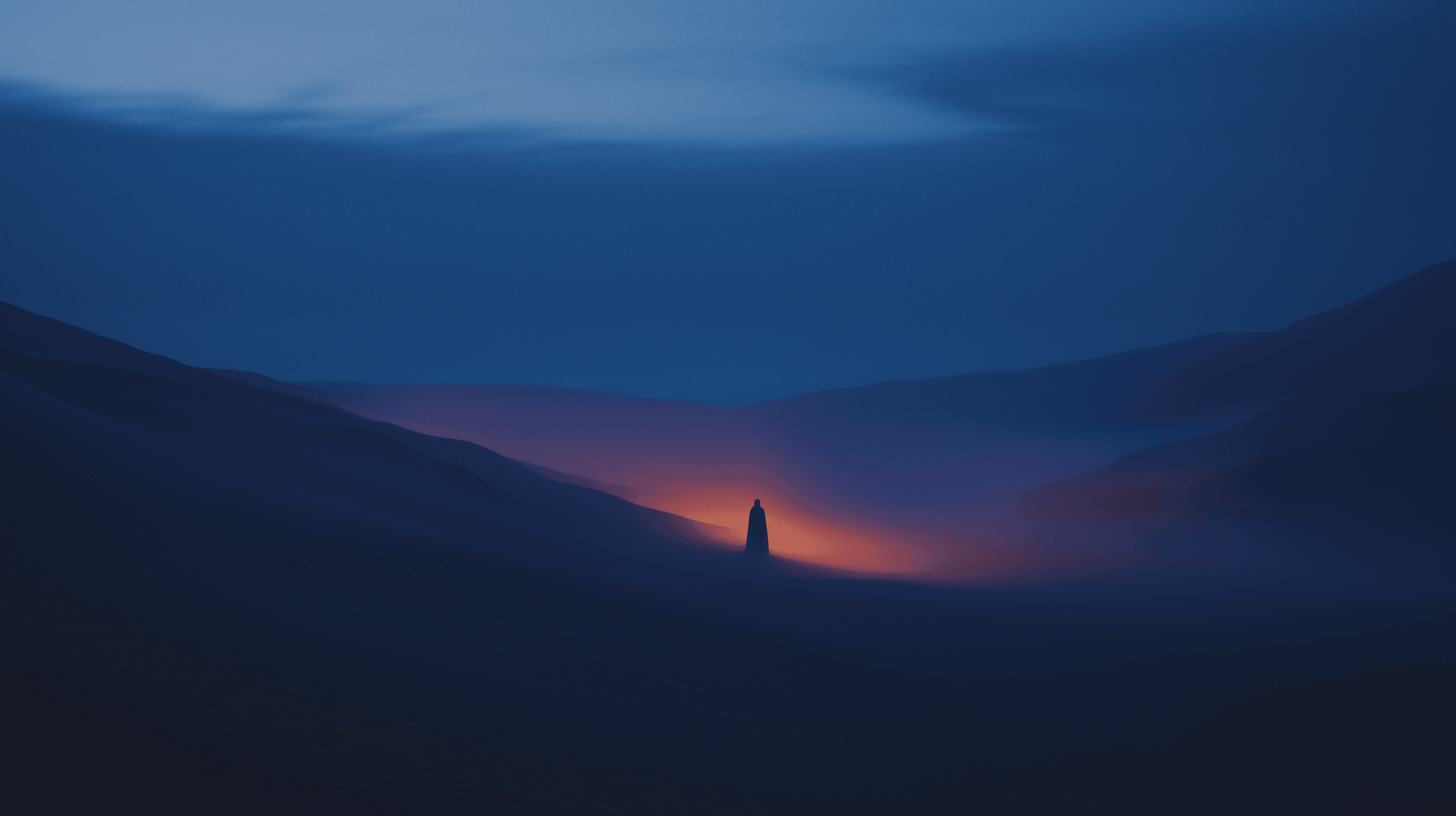 Cinematic desert landscape at dusk with a lone silhouette standing before a warm amber glow, surrounded by dark rolling hills and a deep blue sky.
