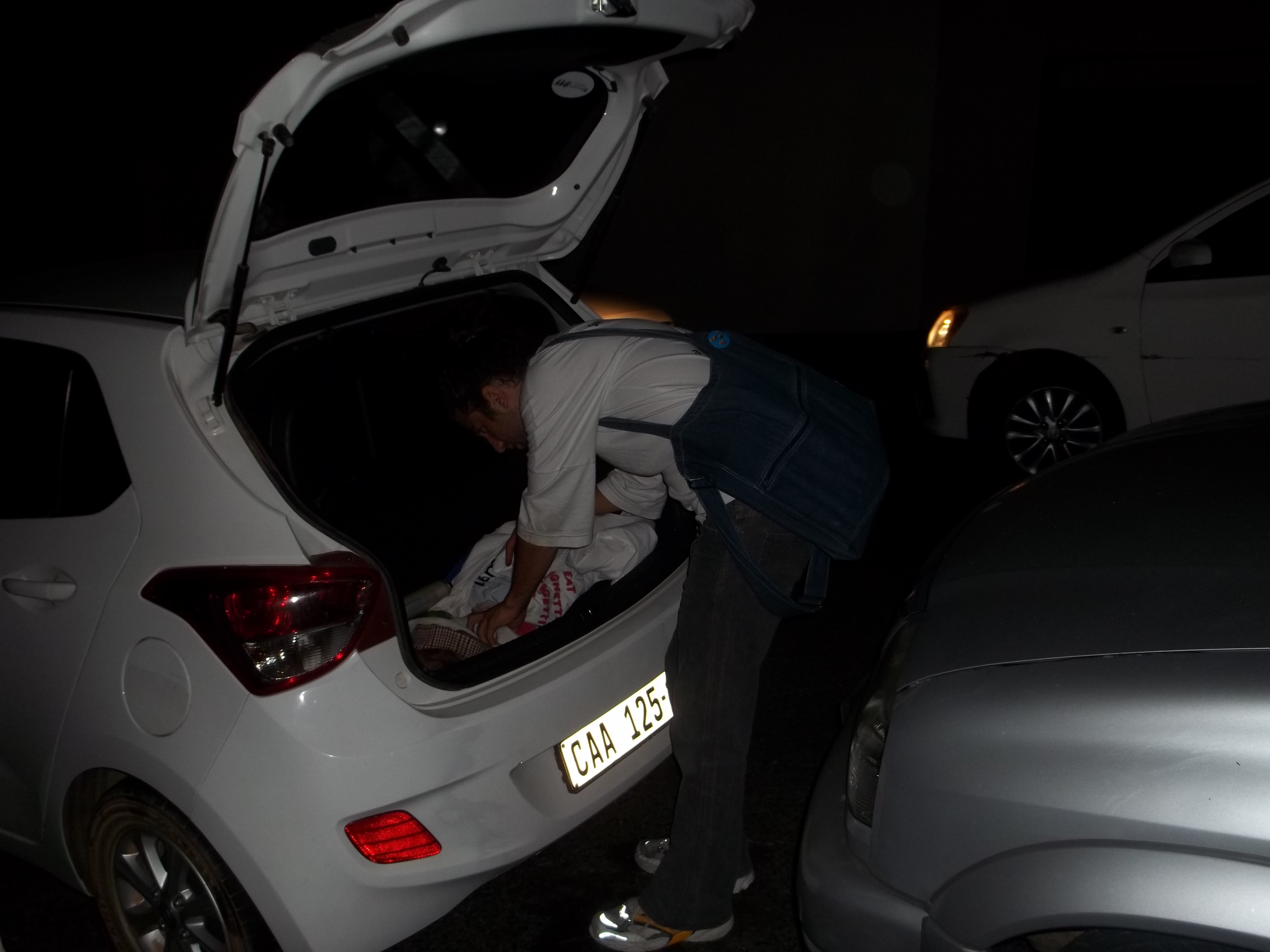 A group of people sitting around a living room