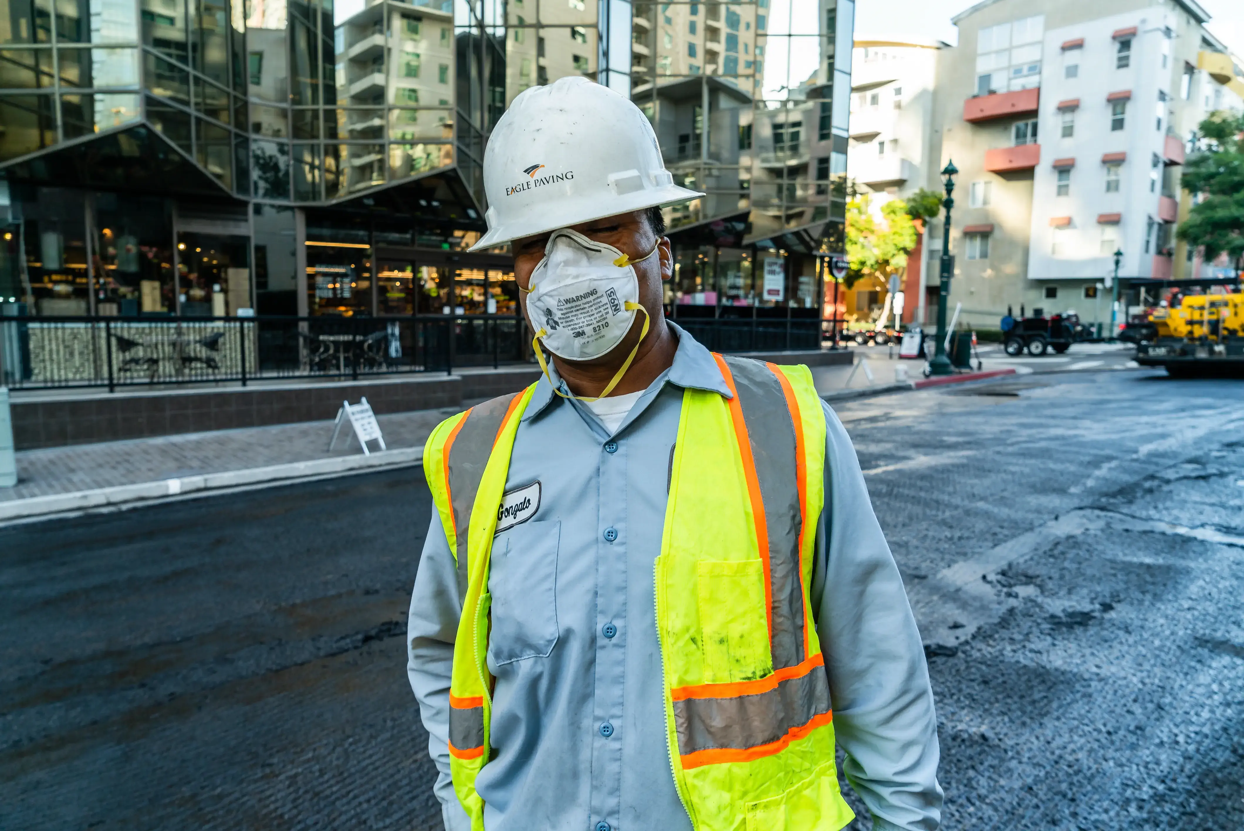 Asphalt crew in masks during COVID-19 pandemic