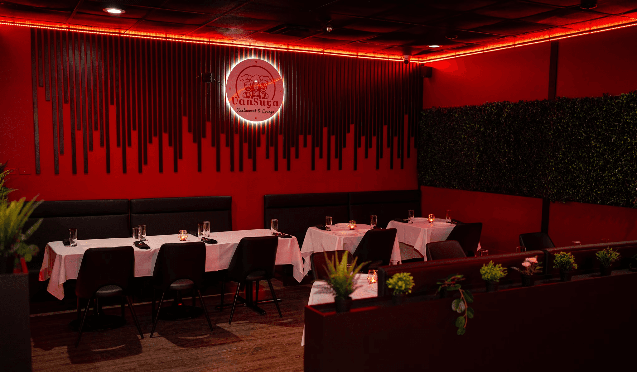 Modern dining area with hanging pendant lights.