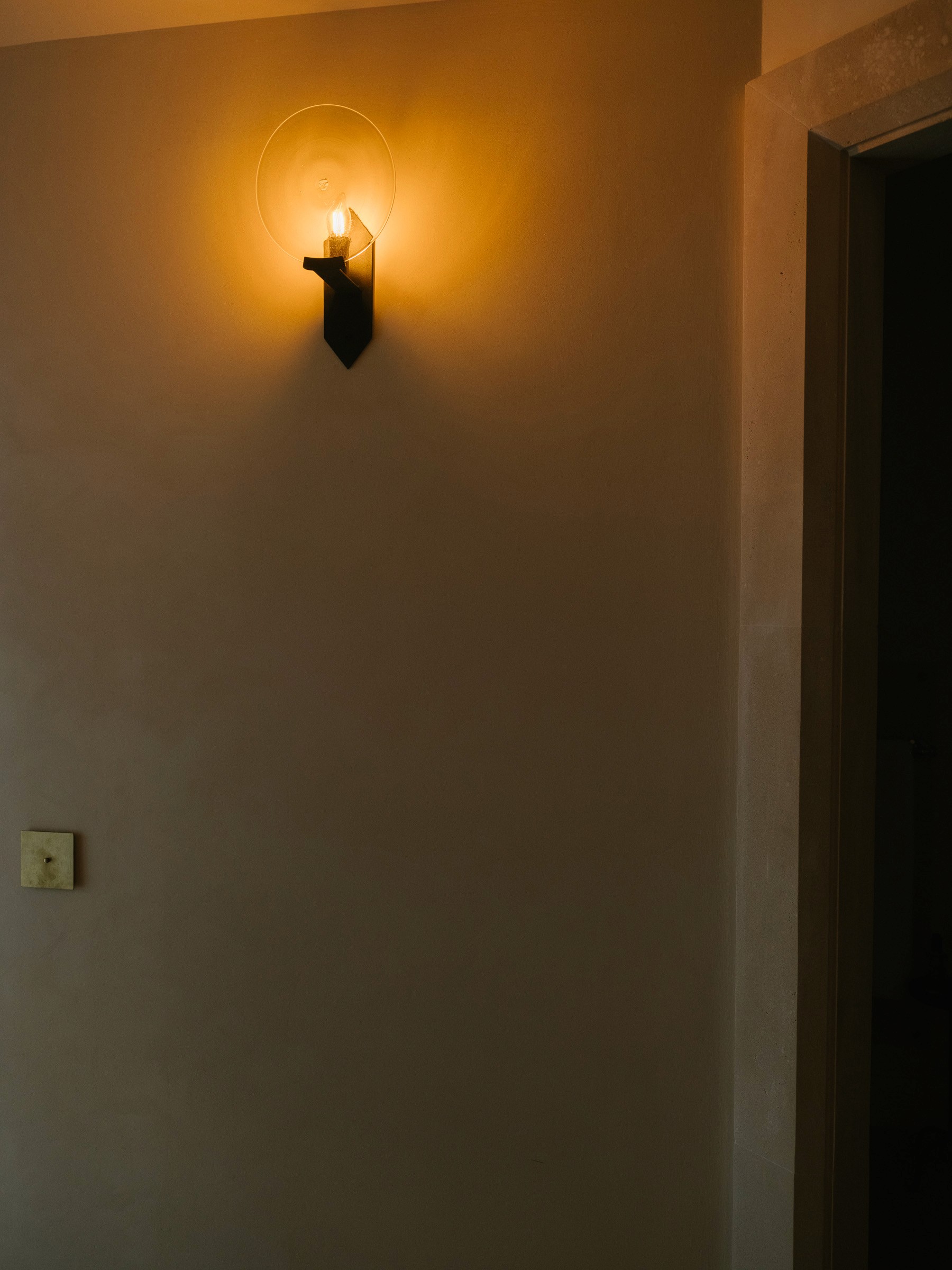 Streetside billboard with flyposters of the Batch.Works brand and illustrations