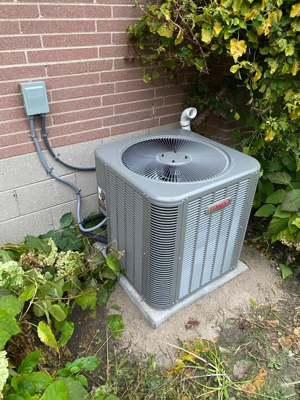 Air conditioner installed in a backyard in North york