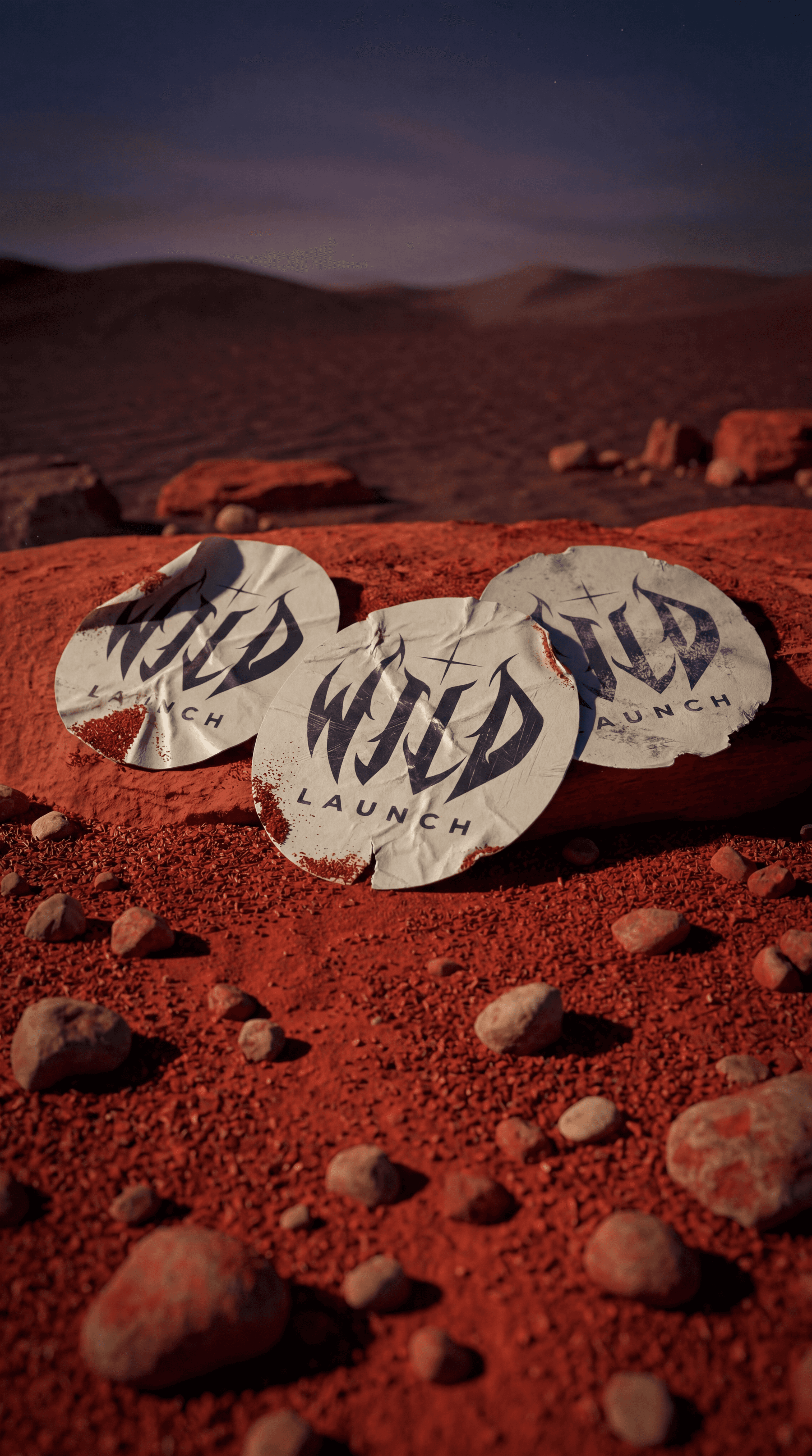 A close-up of a hand wearing multiple decorative rings against a blue background.